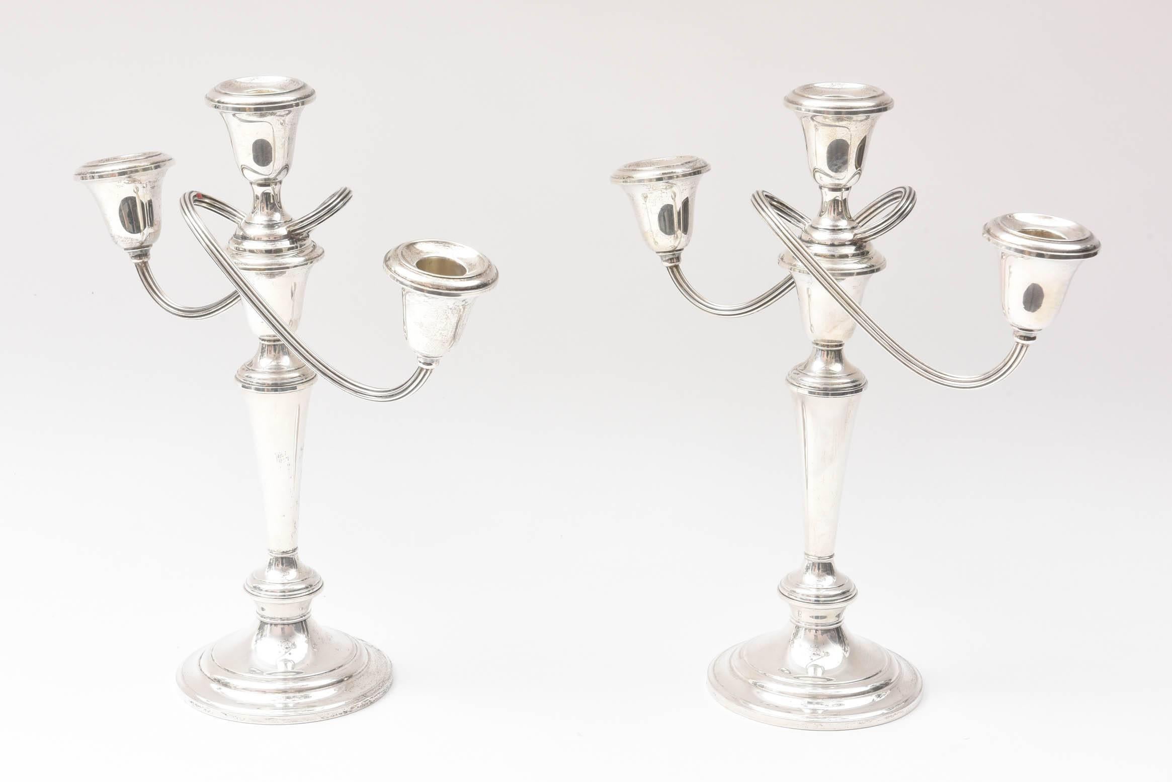 A wonderful pair of vintage candelabra from one of America's storied silversmiths: Gorham. Nicely hand chased details with a delightful twist arm. This pair also converts to a single candlestick. Great vintage condition.
Measure: The single
