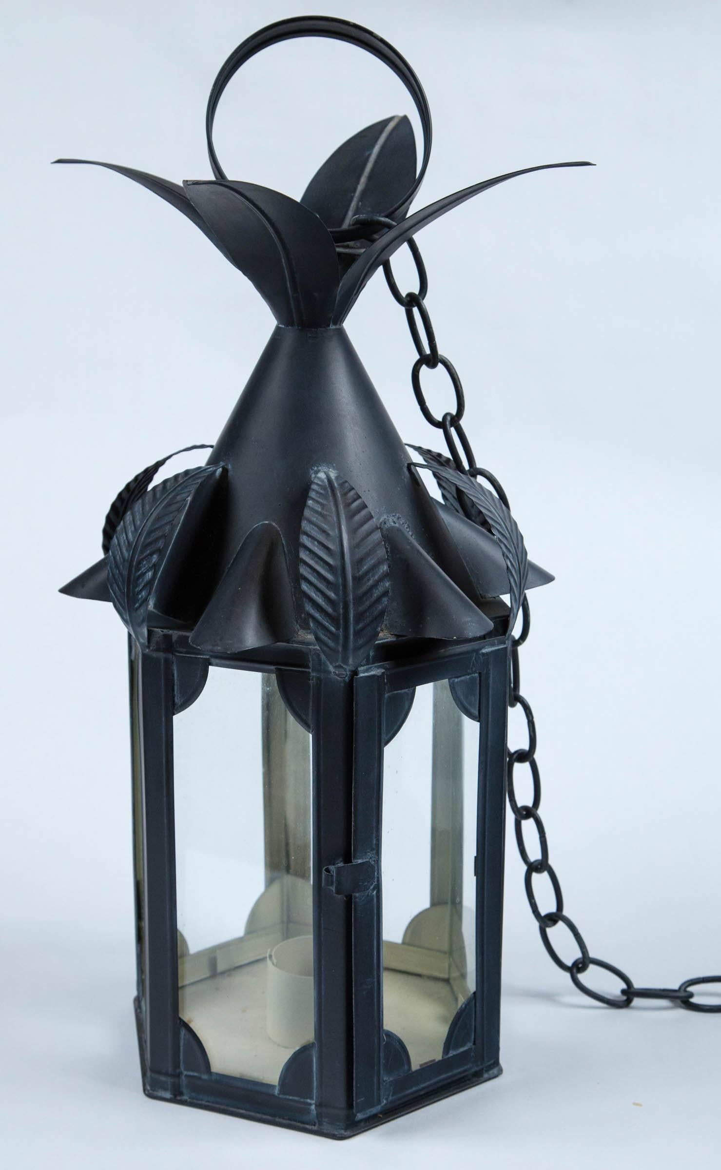 Old new stock small black metal lantern with large leaves. Three lanterns are available. No wiring.