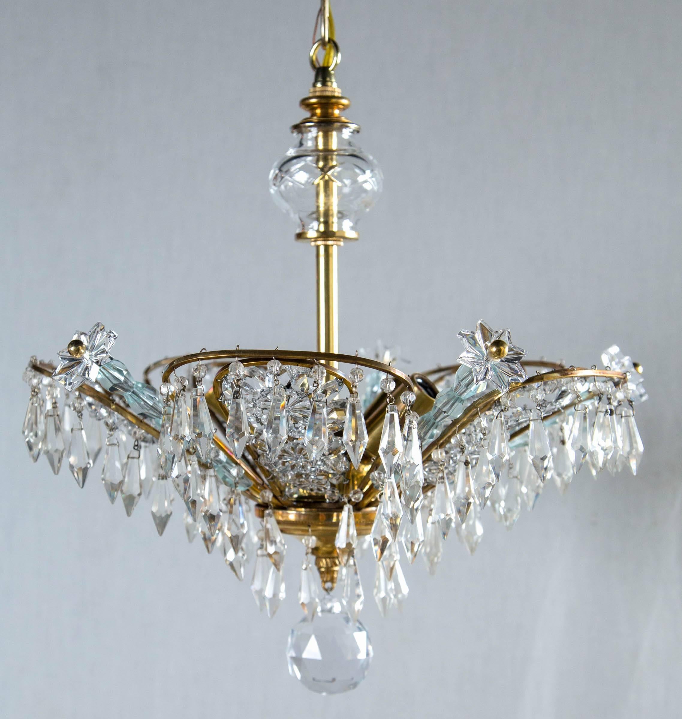 French Bagues light fixture with crystal drops, circa 1930s. Four fixtures available. Priced per fixture.