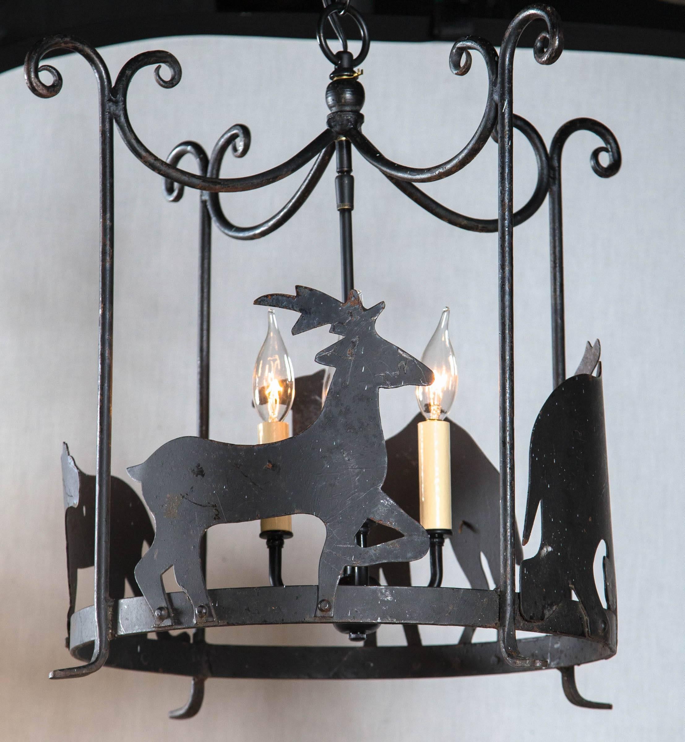 Late 20th Century Pair of Whimsical Iron Chandeliers
