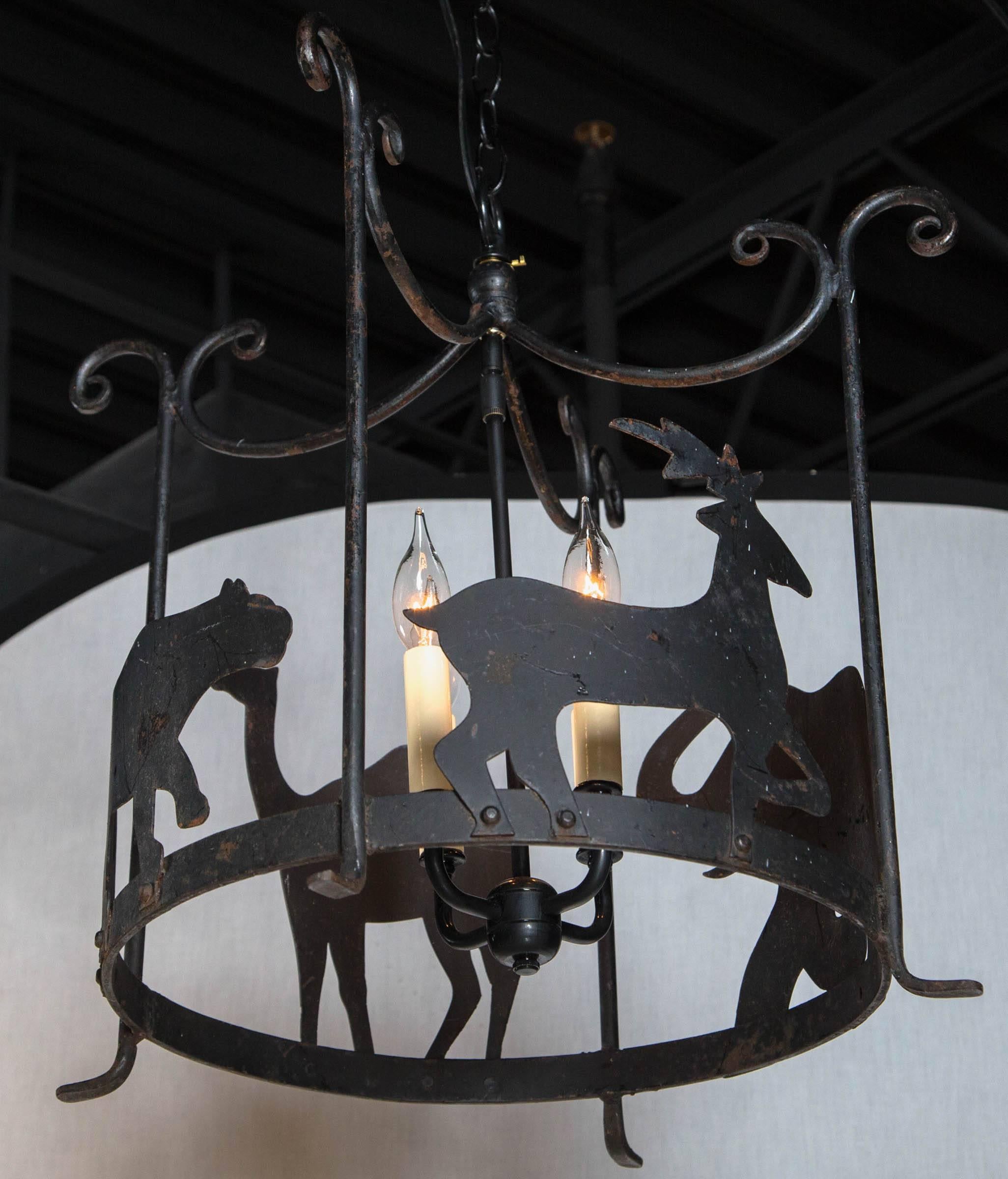 Pair of Whimsical Iron Chandeliers 1