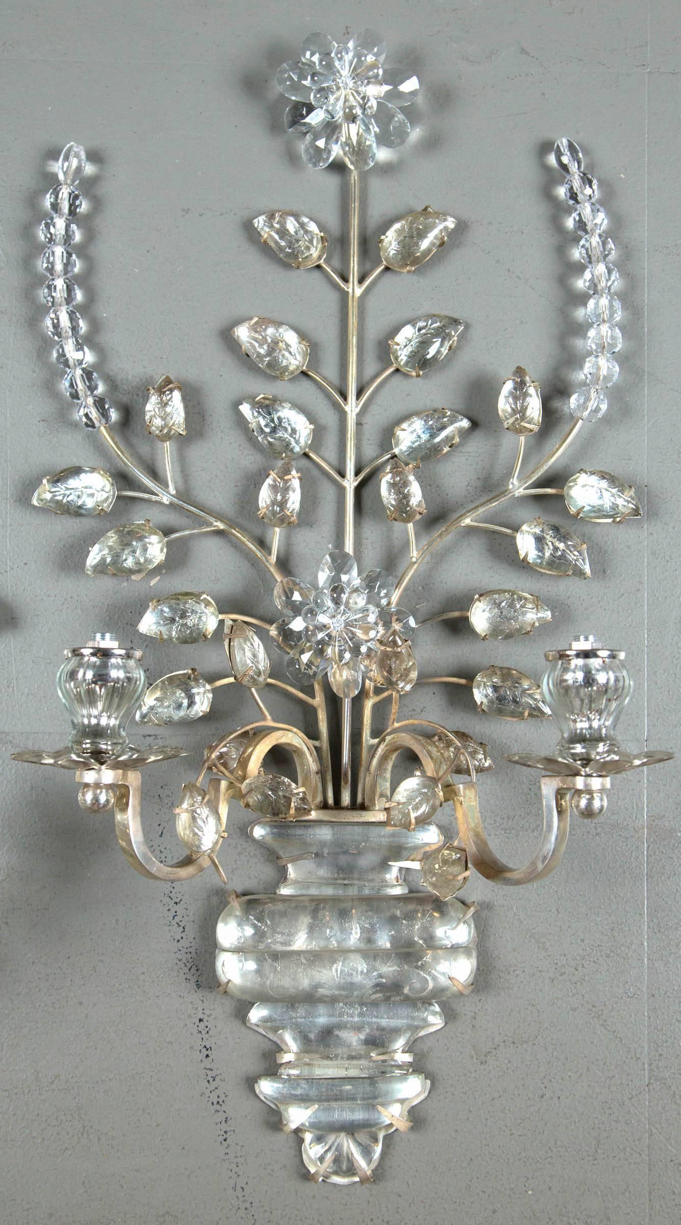 A set of eight, circa 1930 French silver plated sconces; $5800 list pair; four pairs available.