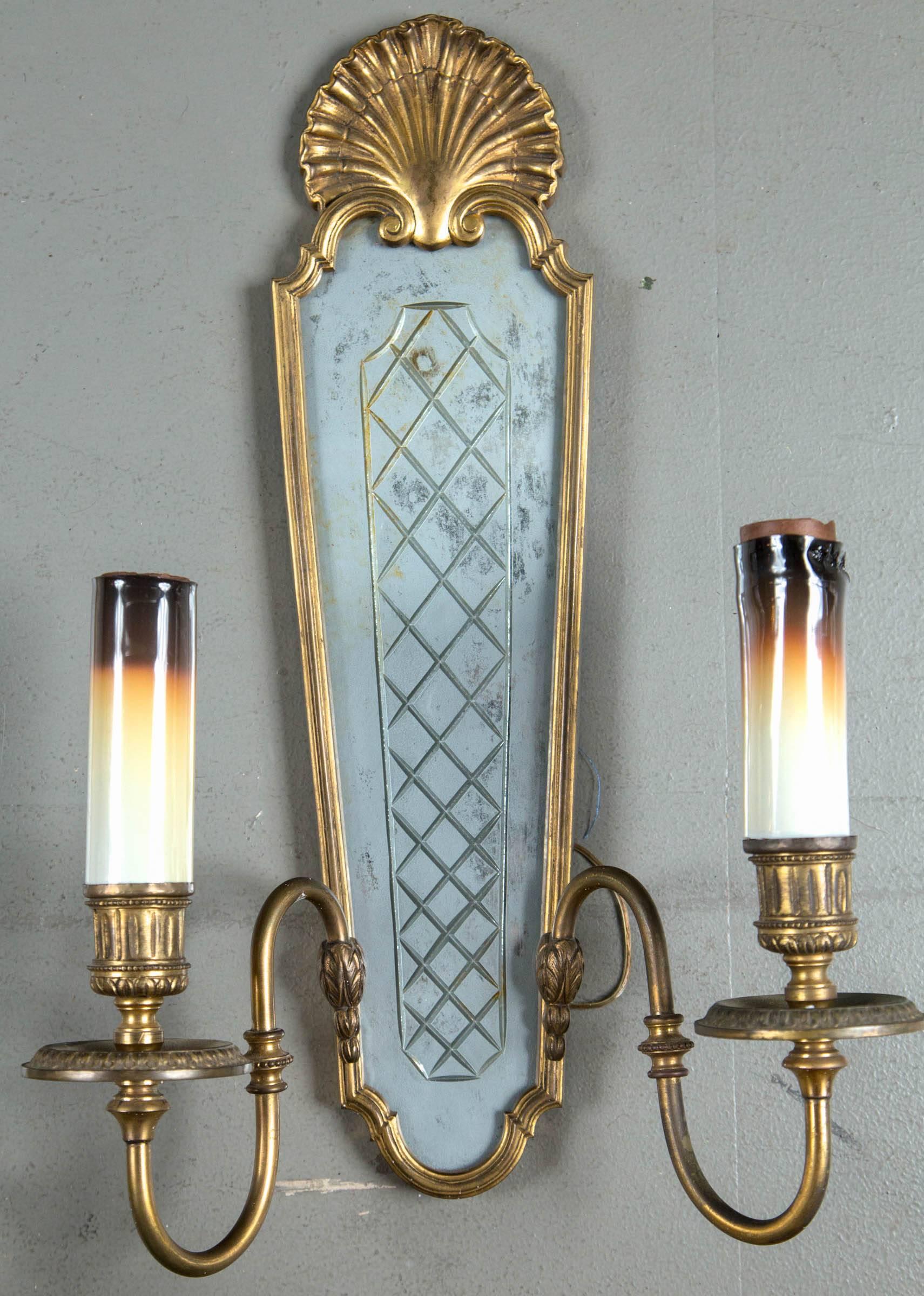 Caldwell two-light sconces with etched mirror backplate, circa 1920s. Set of six available priced per pair.