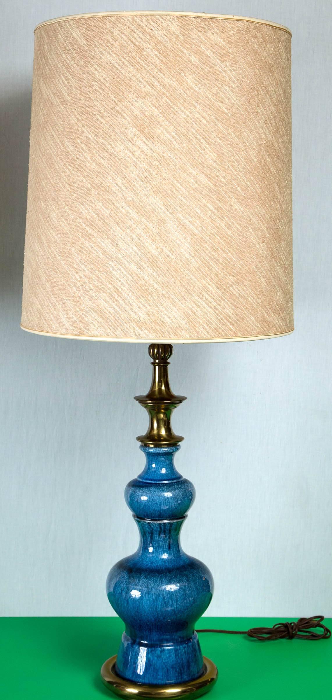 Pair of exquisite blue ceramic Stiffel lamps in a pagoda shape. Original shades included as in photos. Height is to top of finial.