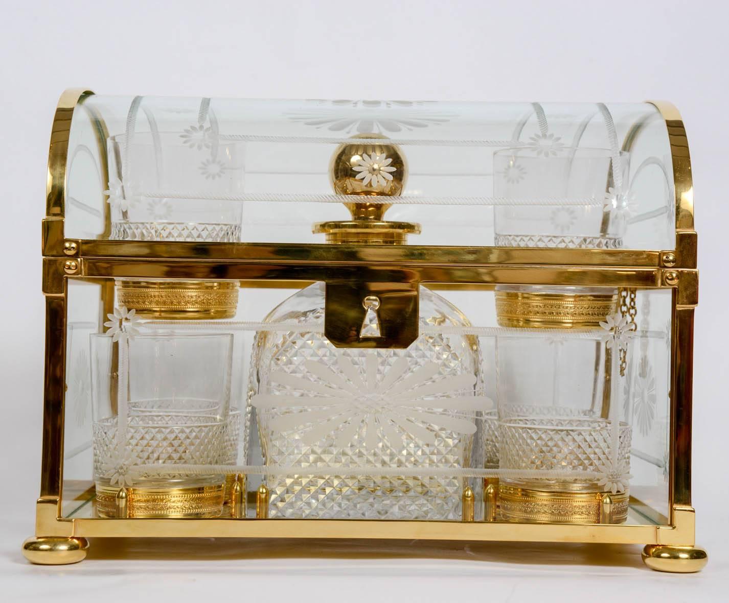 Crystal and gilded bronze box, with a set of six glasses and one bottle for whisky.