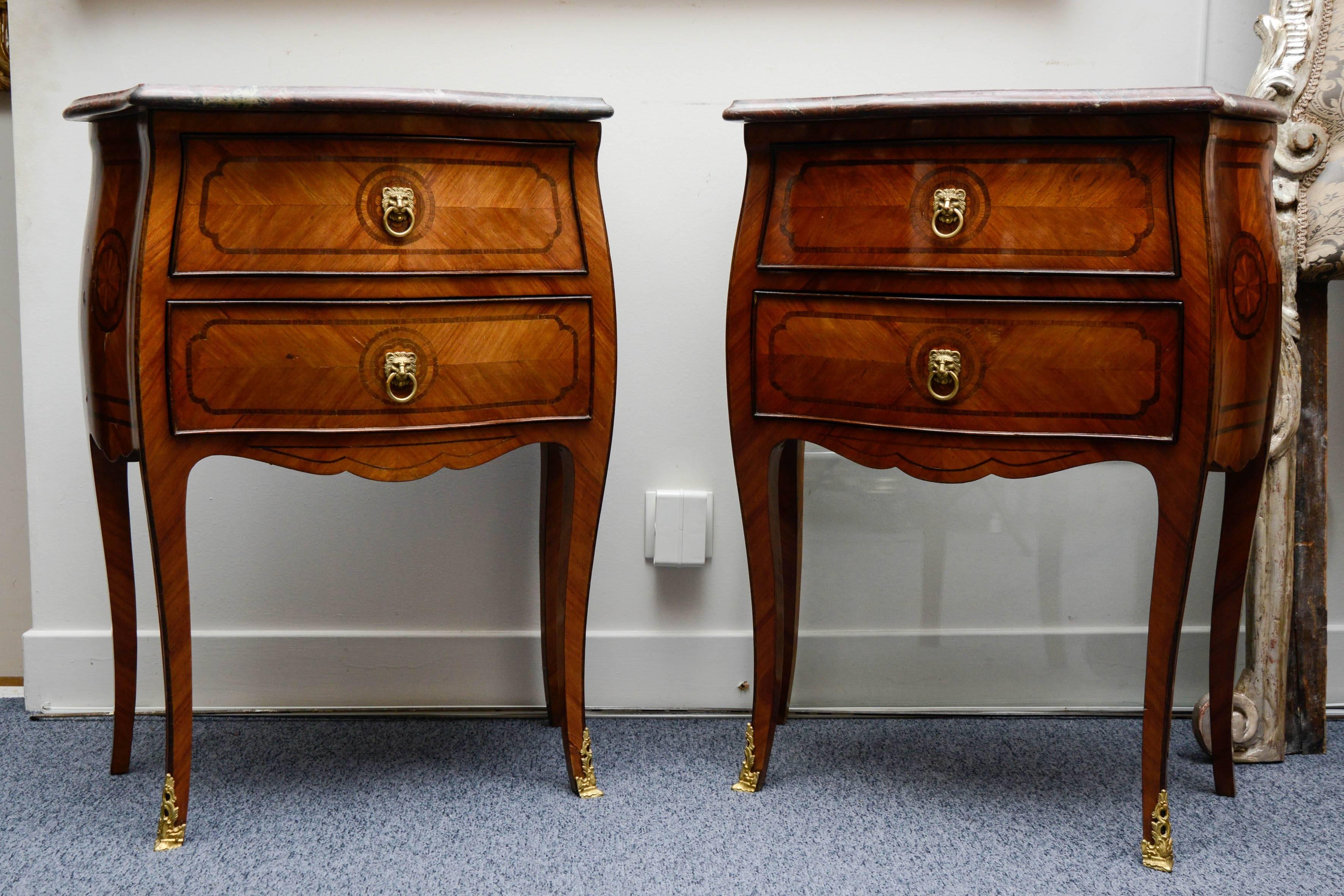 Pair of side tables, marquetry of diverses precious woods topped with a red marble.