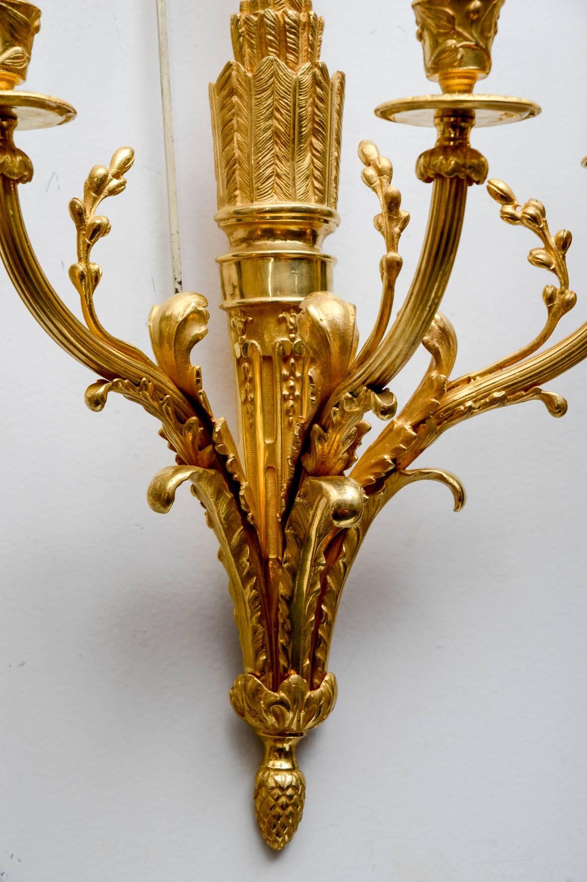 Pair of Glided Bronze Louis XVI Style Sconces In Excellent Condition For Sale In Paris, FR