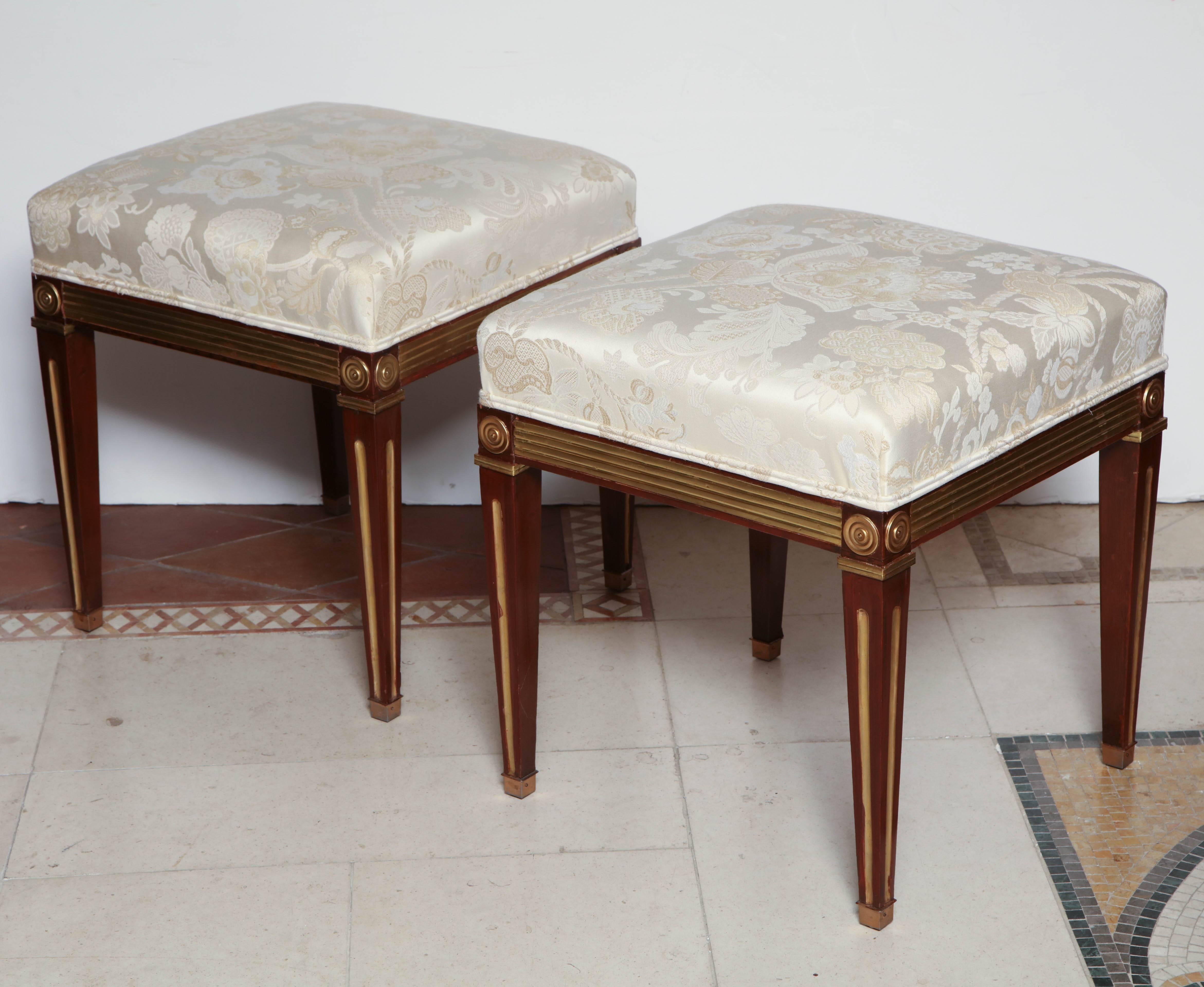 Pair of Russian neoclassic mahogany and brass stools.