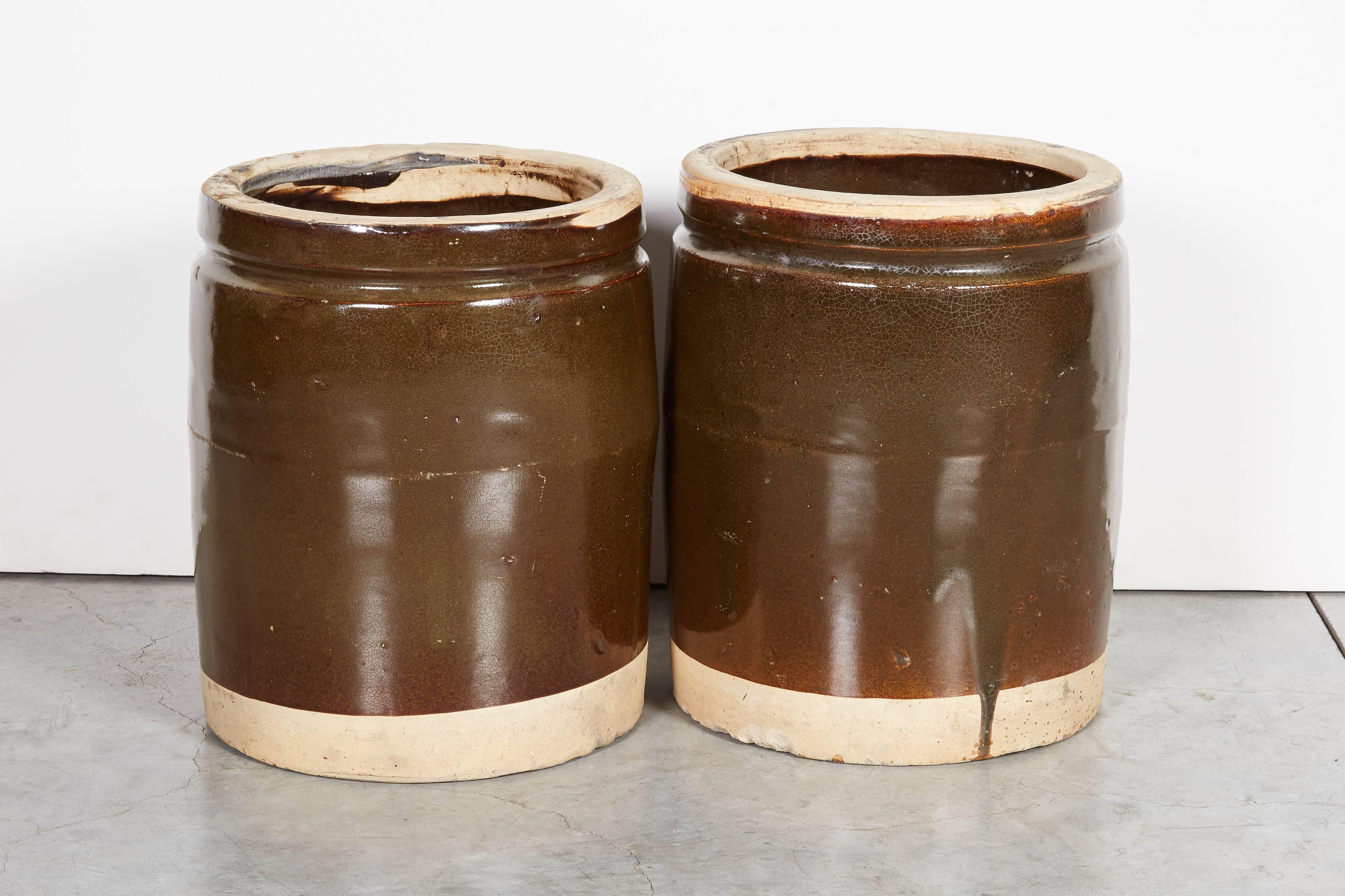 Two beautifully glazed vintage Chinese ceramic food jars with a simple shape that will enhance any contemporary interior. These thick walled jars have real heft and presence. From Shanxi Province. Priced individually.
CR695
