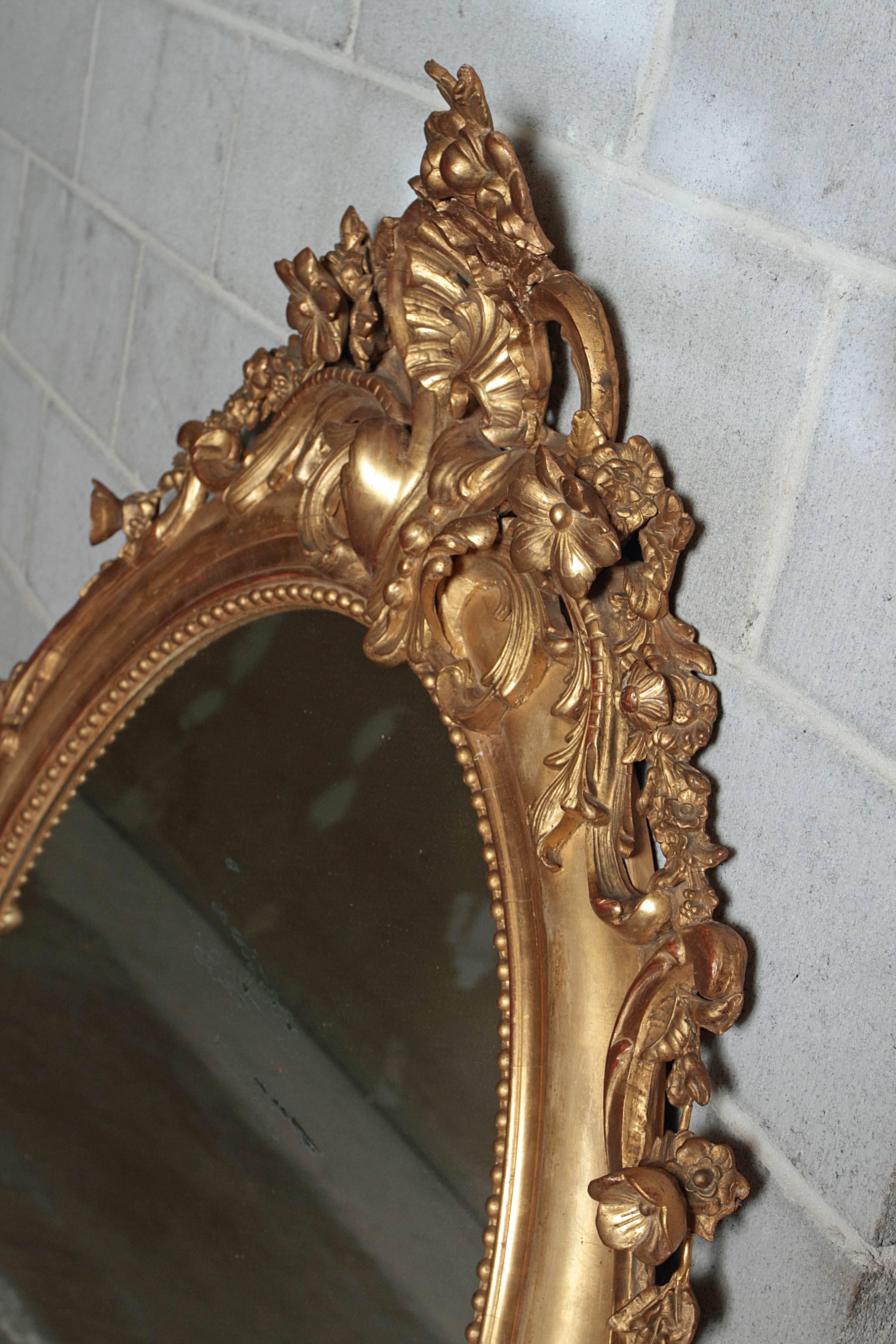 Giltwood French 19th Century Carved and Gilt Beautiful Louis XV Oval Mirror