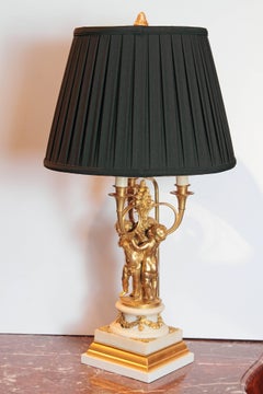 Pair of 19th Century French Gilt Bronze and Marble Based Cherub Lamps