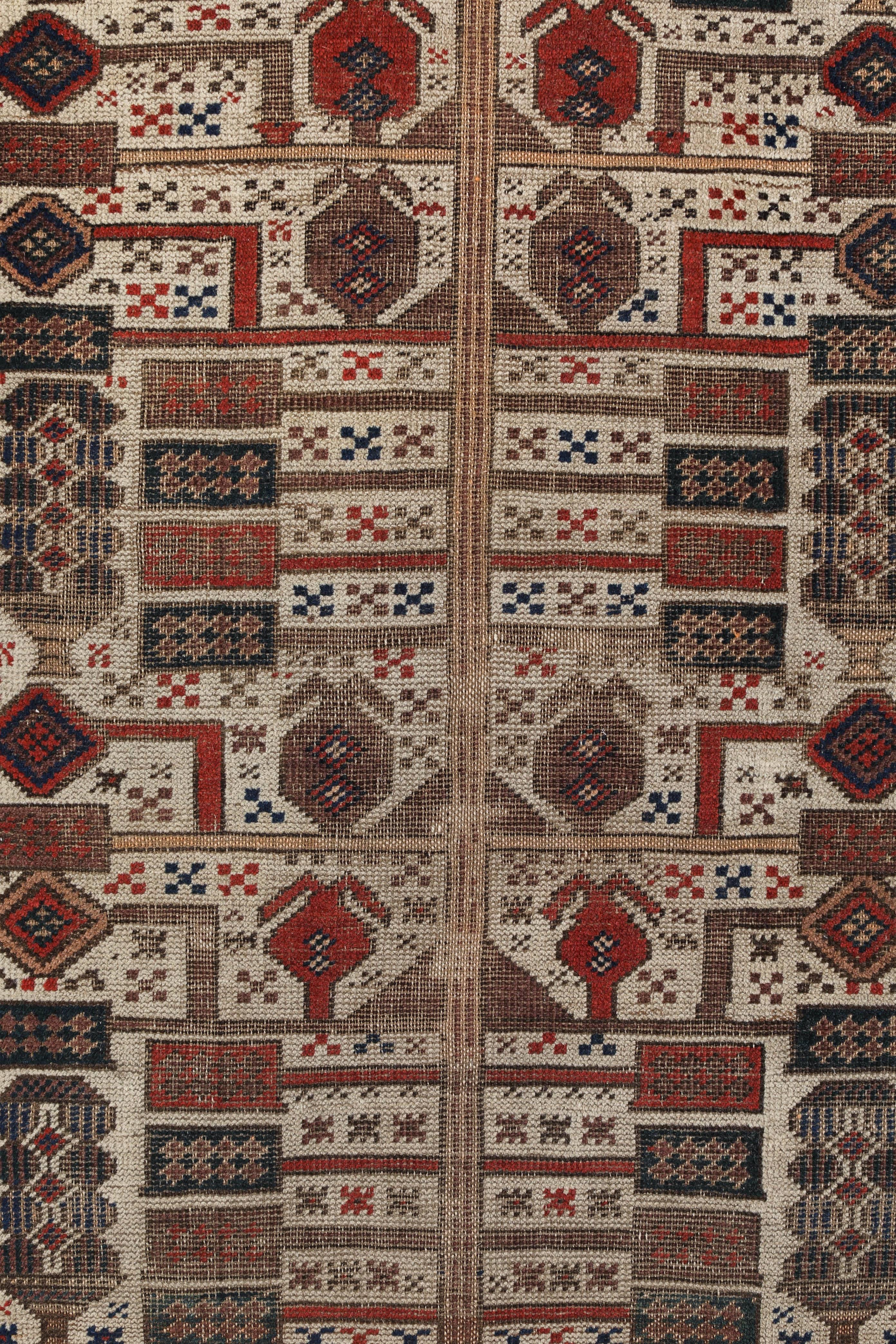 Persian tribal rug. Unusual white ground and geometric design. Hand-knotted, natural dyes. Worn pile with conserved sides and missing ends as shown.
