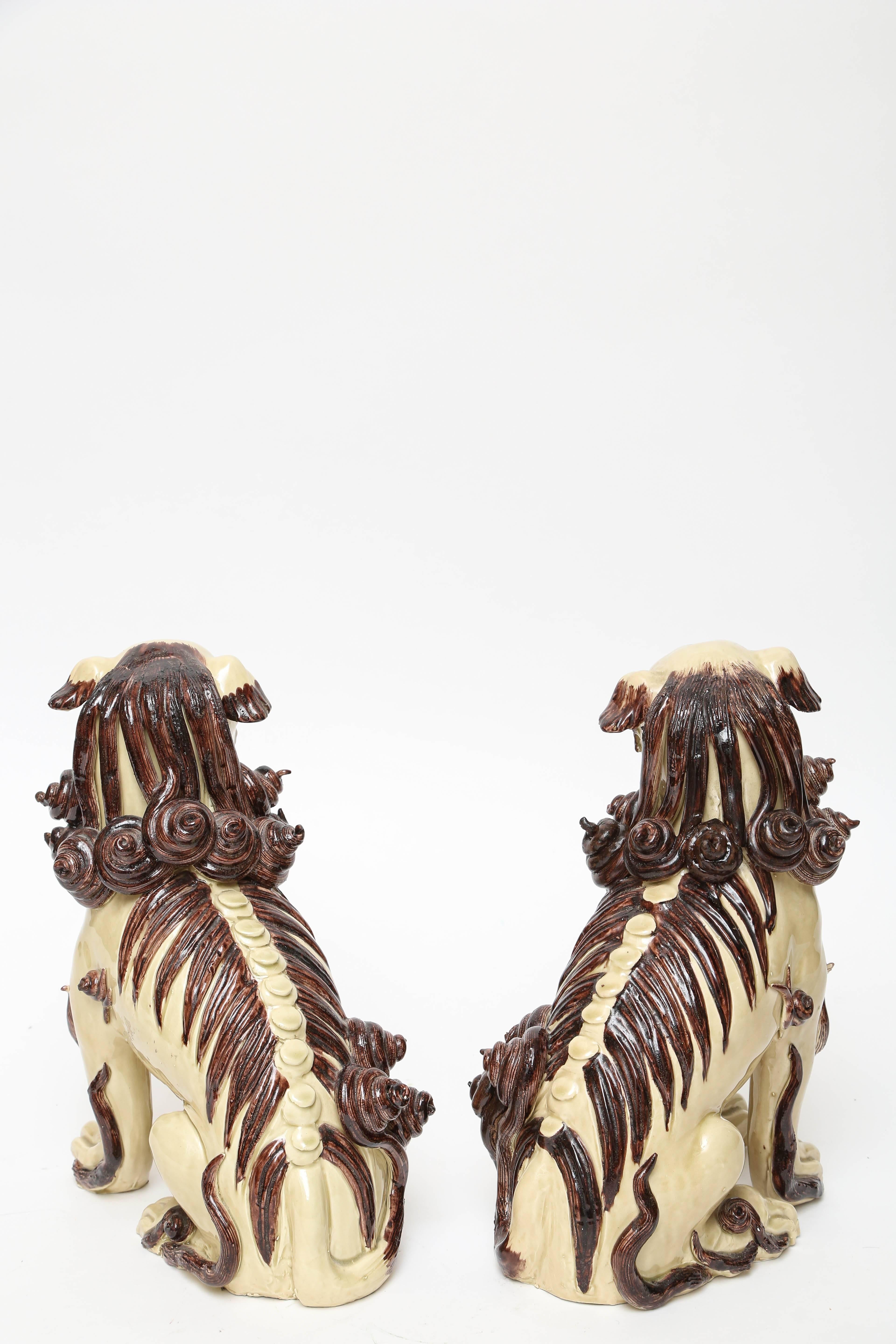 Pair of Glazed Terra Cotta Foo Dogs In Good Condition For Sale In West Palm Beach, FL