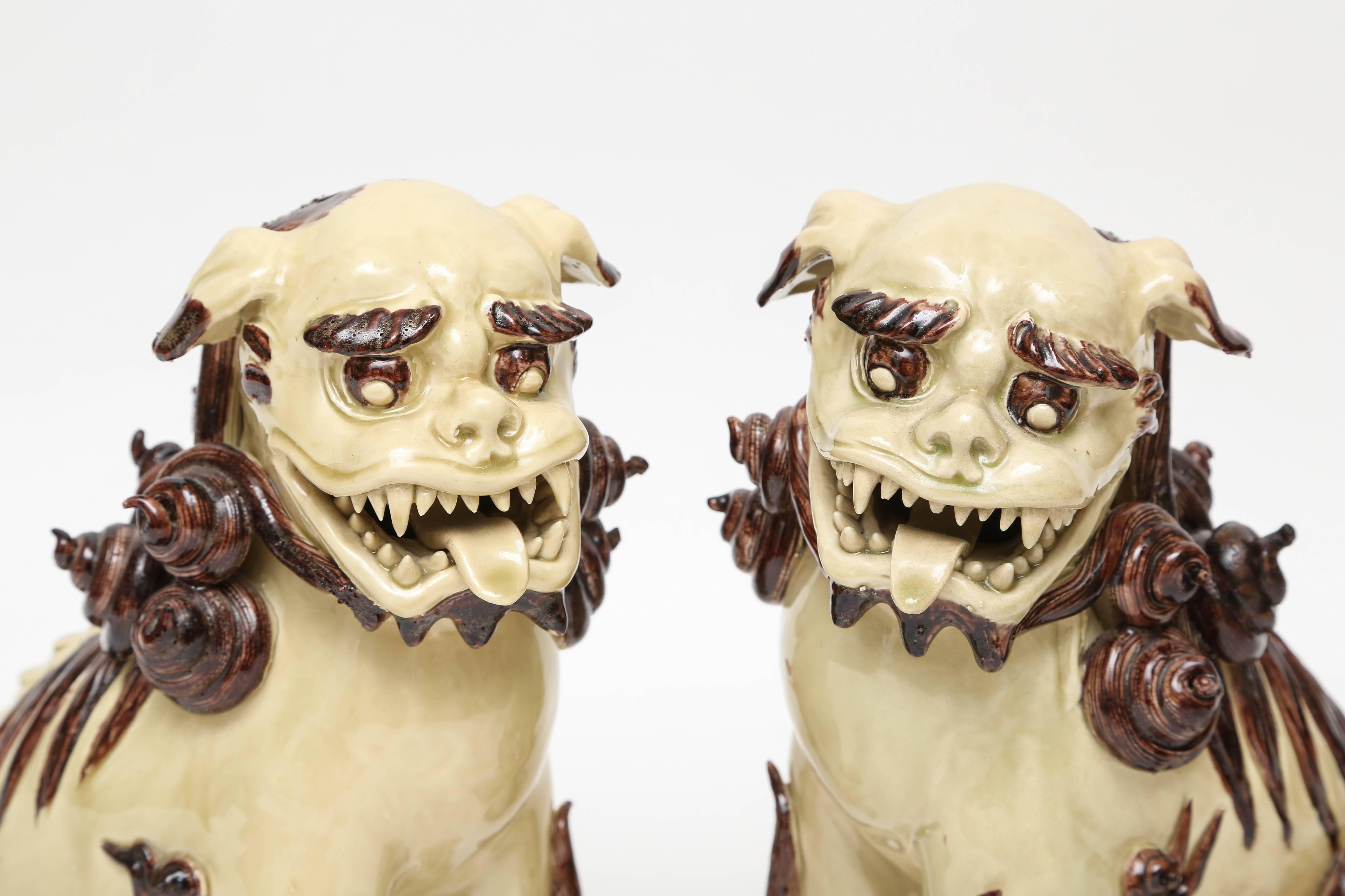 20th Century Pair of Glazed Terra Cotta Foo Dogs For Sale