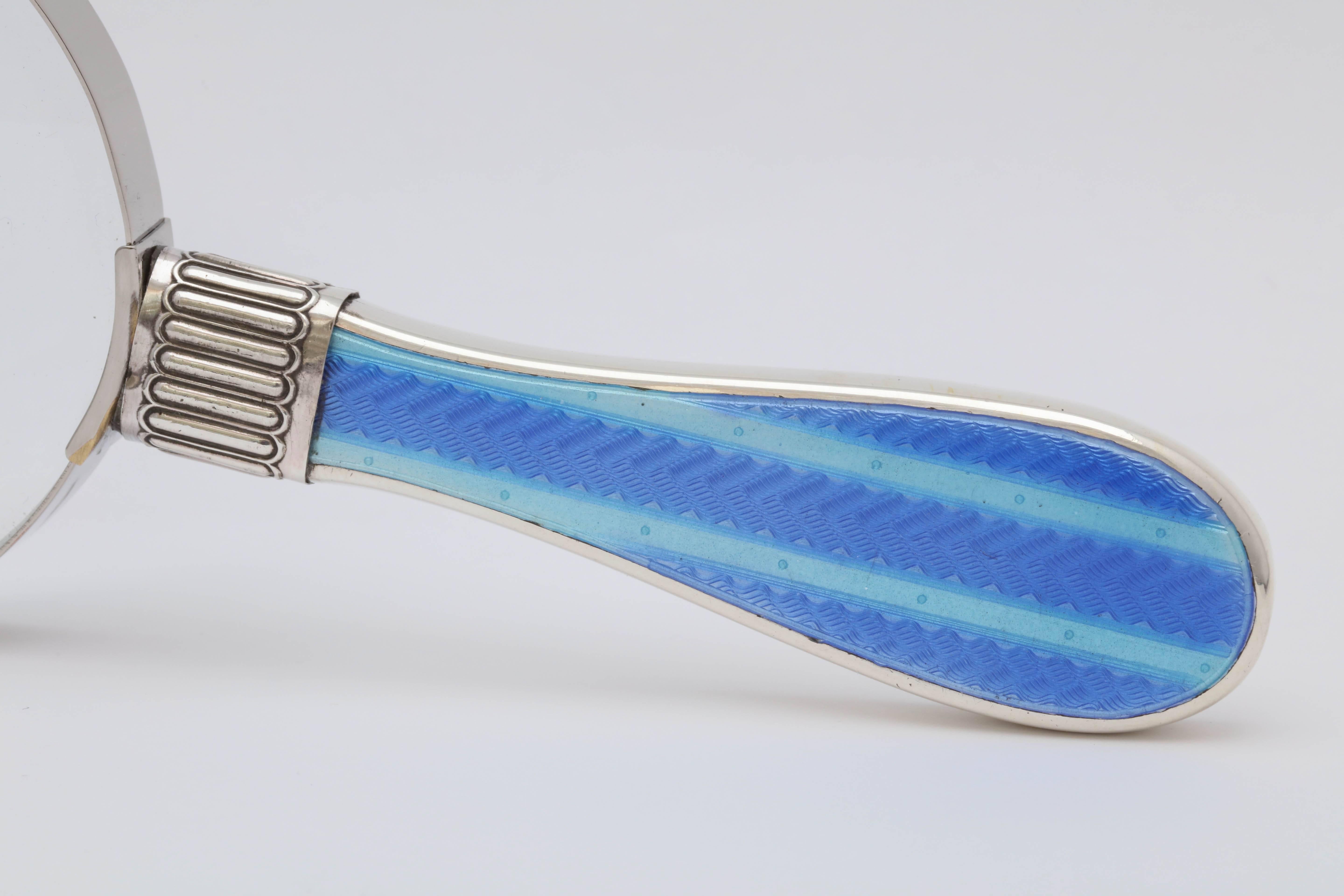 Unusual, Victorian, sterling silver and dark blue guilloche enamel - mounted magnifying glass, the dark blue enamel having lighter blue stripes, Sheffield, England, 1899, W. R. Humphreys - maker. Guilloche enamel that covers the sterling silver