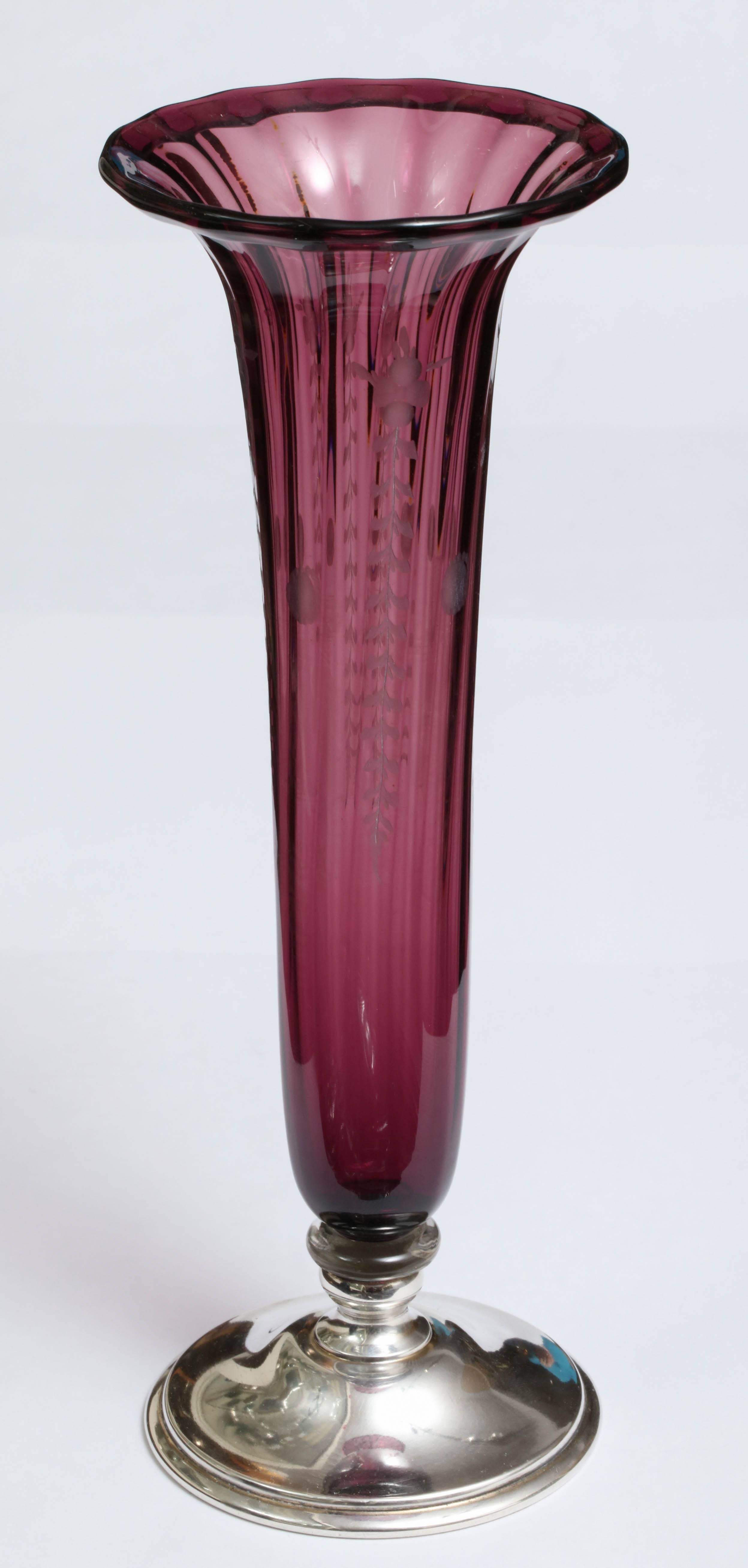 Unusual,sterling silver-mounted, etched, purple/wine colored crystal vase, T. G. Hawkes and Company, New York, circa 1905. Crystal is rippled, and has lovely, delicate, clear hanging garlands etched into it. 9 inches high x 3 1/8 inches diameter