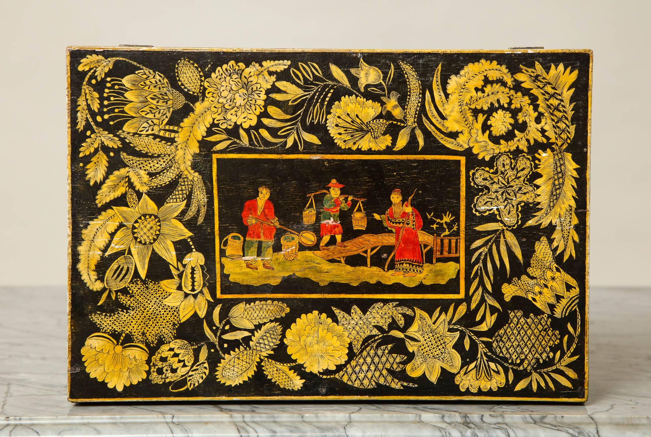 Fine early 19th century English Regency period penwork box, the center panel and front with polychrome chinoiserie decoration, the borders profusely decorated with flowers and vines, the interior with similar design to lid.  The whole with original