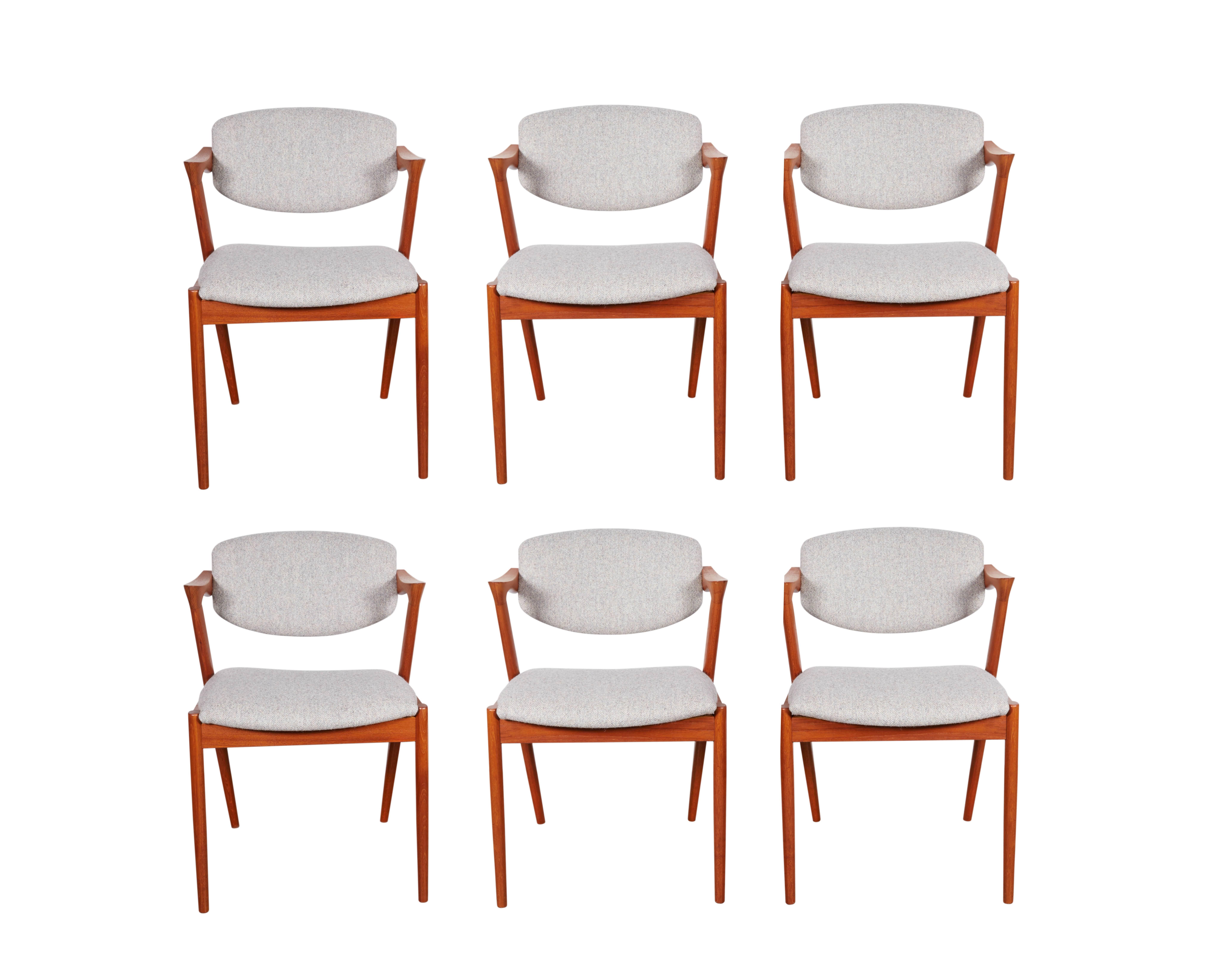 Vintage 1950s Teak Danish Dining Chairs by Kai Kristiansen

NOTE: THIS IS A SET OF 4 (PICTURE IS WRONG)

These vintage side chairs are in like-new condition. The swivel back that adjust to the angle your back makes it like a little lounge chair at