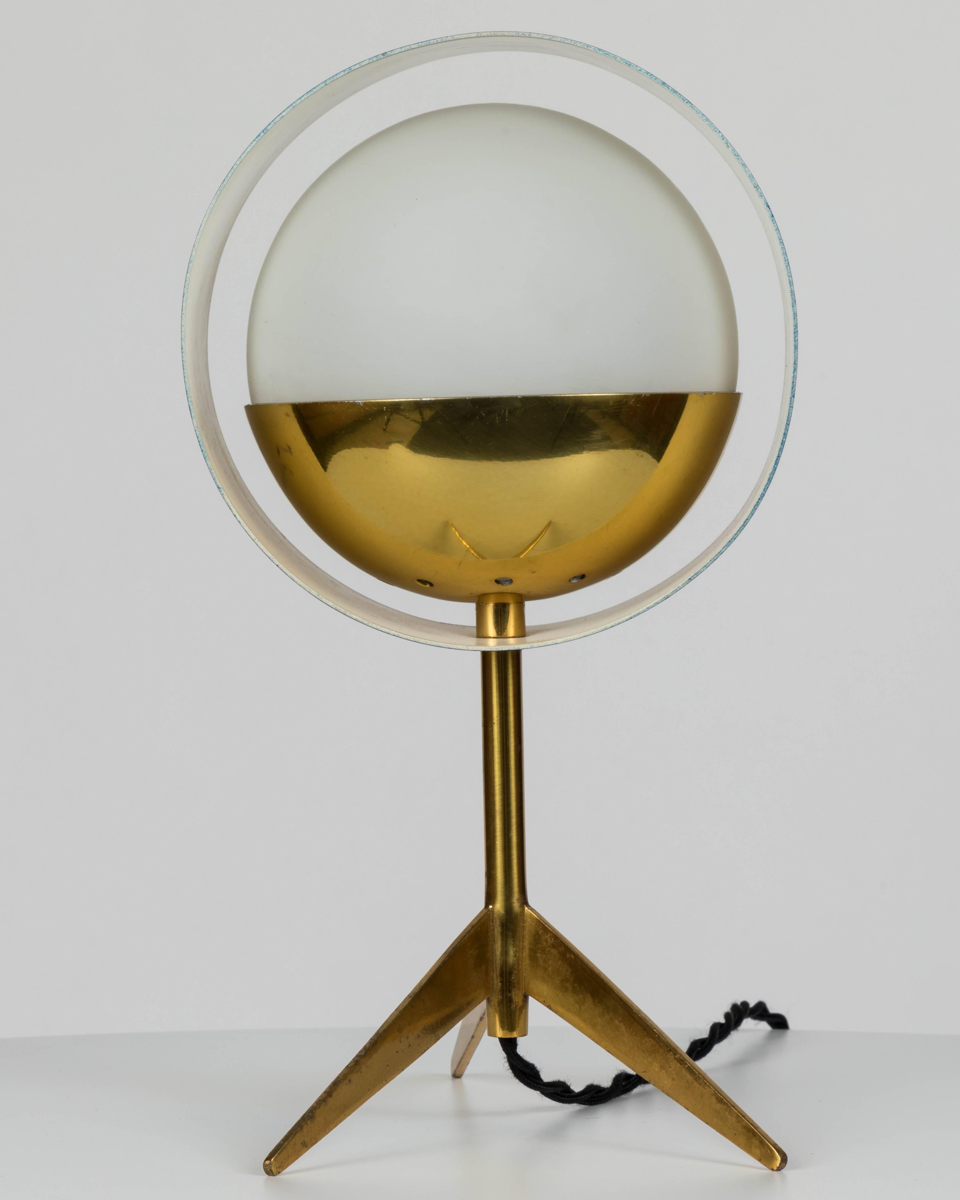 1950s Stilux Milano brass and glass tripod 'Saturn' table lamp. This extremely rare and iconic design is executed in original opaline glass, lightly patinated brass and blue painted metal with original color in very good vintage condition and