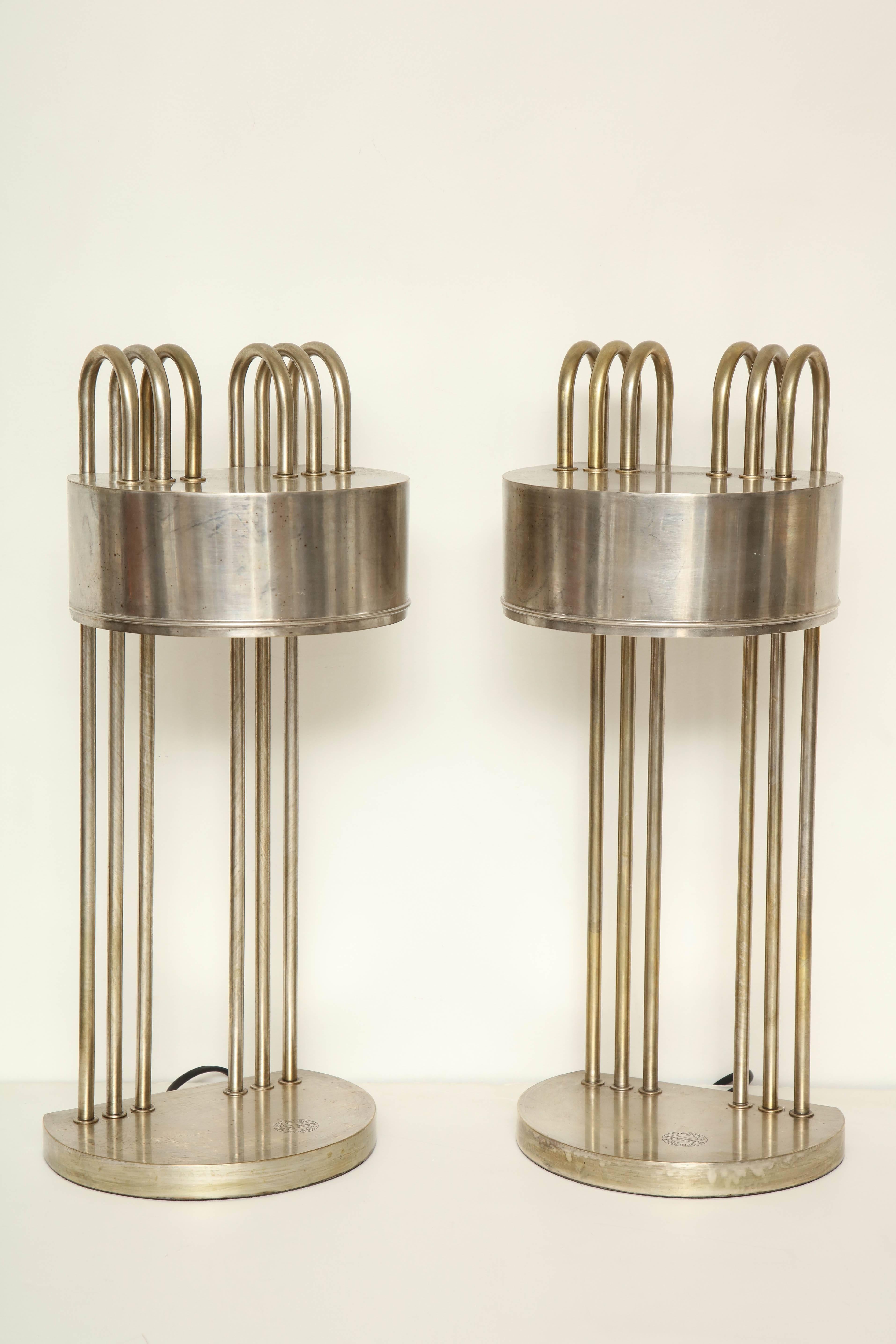 Pair of nickel-plated brass table lamps by Marcel Breuer from the Paris Exhibition, 1925. Stamp marked on base and also marked on bottom. Recently rewired for US specifications.


Available to see in our NYC Showroom 
BK Antiques
306 East 61st St.