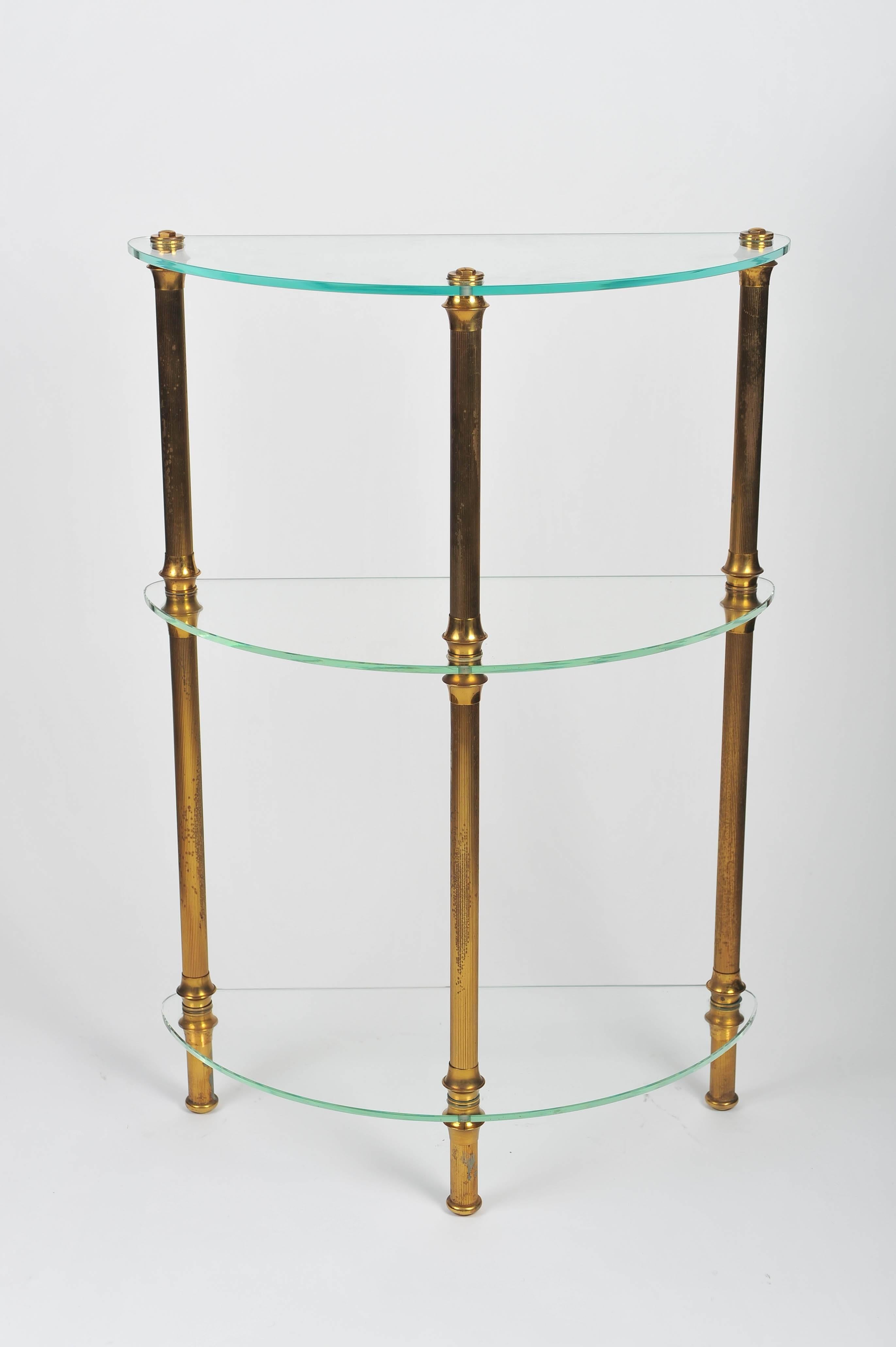 Italian 1950s brass console table with three glass shelves.