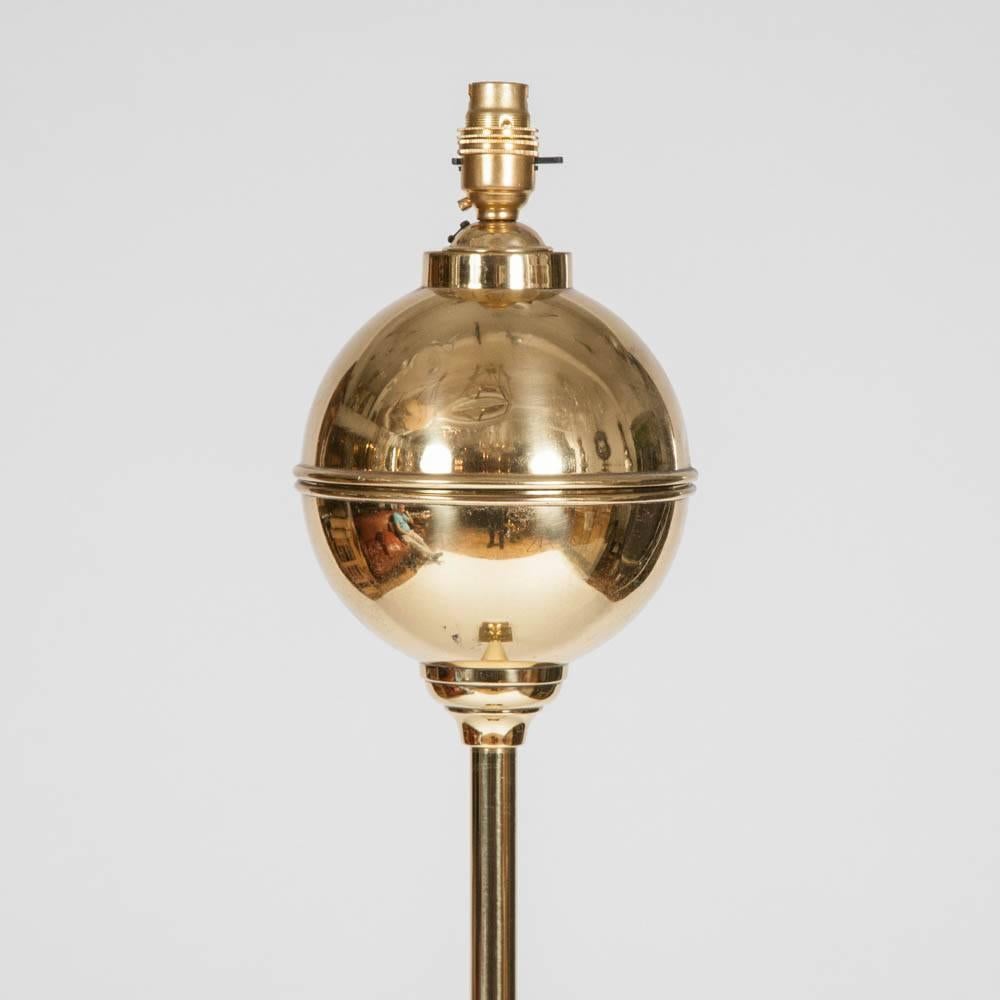 A fine quality brass ball top standard lamp with hexagonal column and cast iron weighted base. Weight marked 19.

Adjustable height.

Wired for electricity.

 
