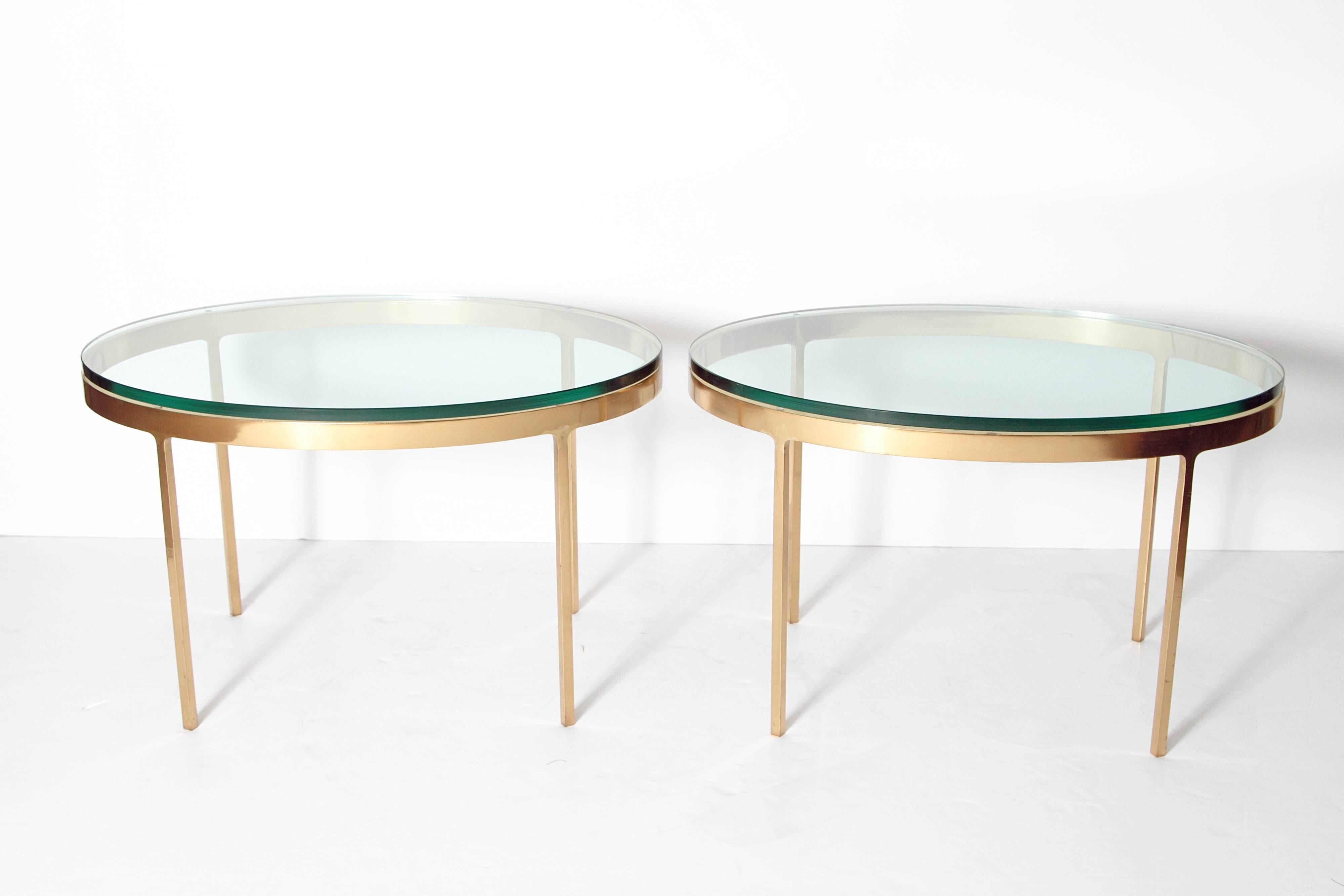 Rare, hard to find, oval side tables of brass and 3/4