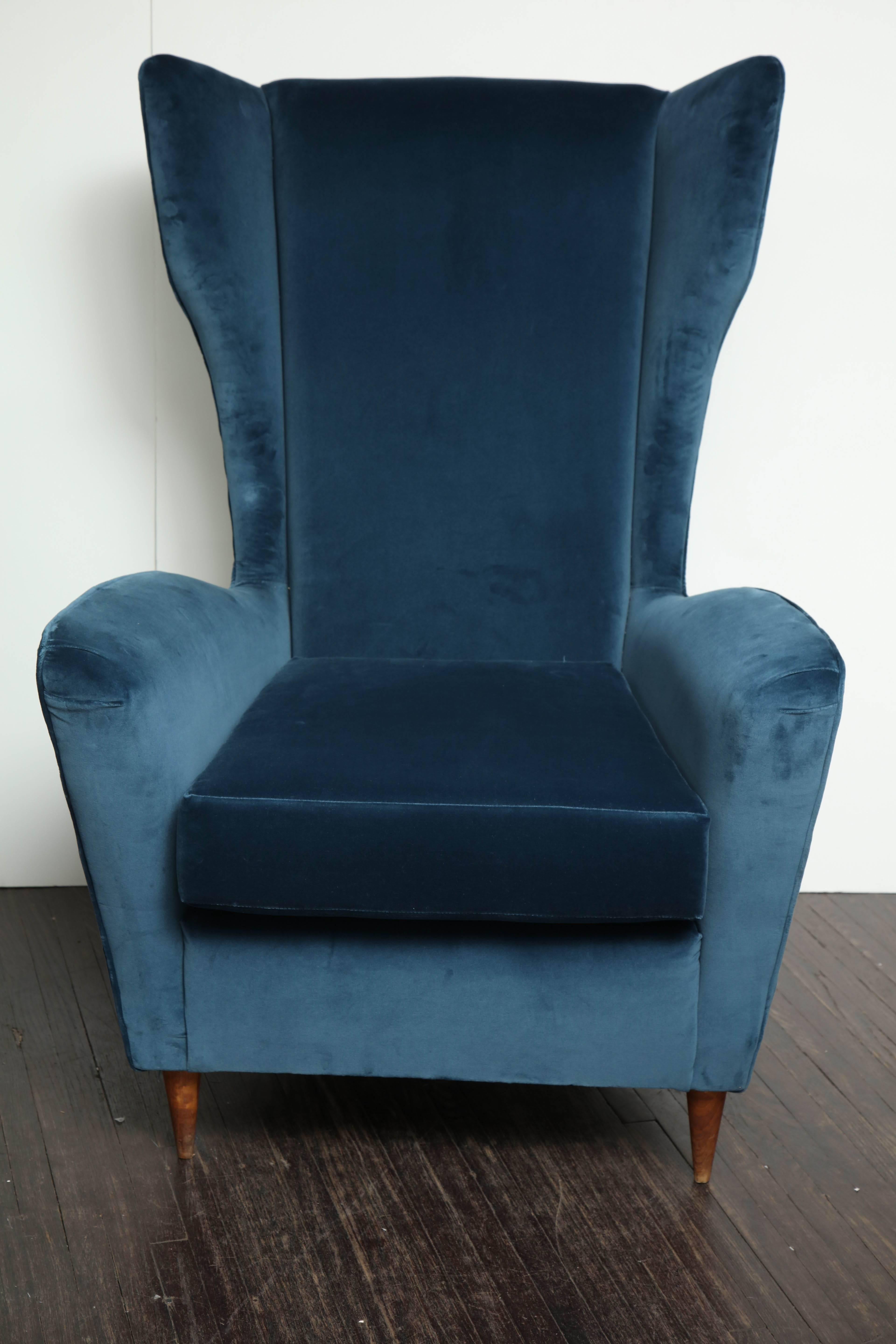 Vintage Italian modern wingback chairs in blue velvet.