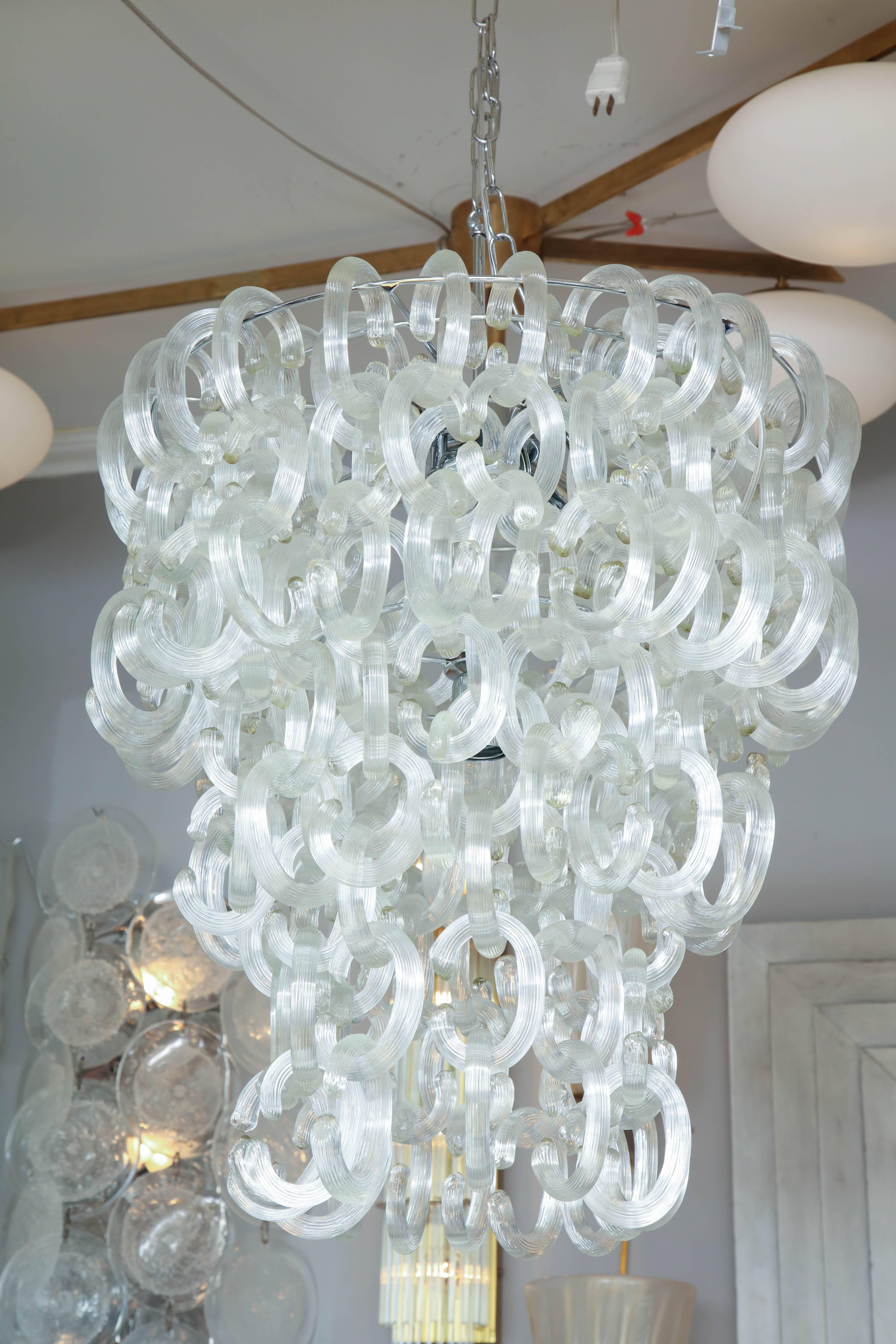 Custom Clear Murano C-link glass chandelier. Customization is available in different sizes, shapes, glass colors and finishes.