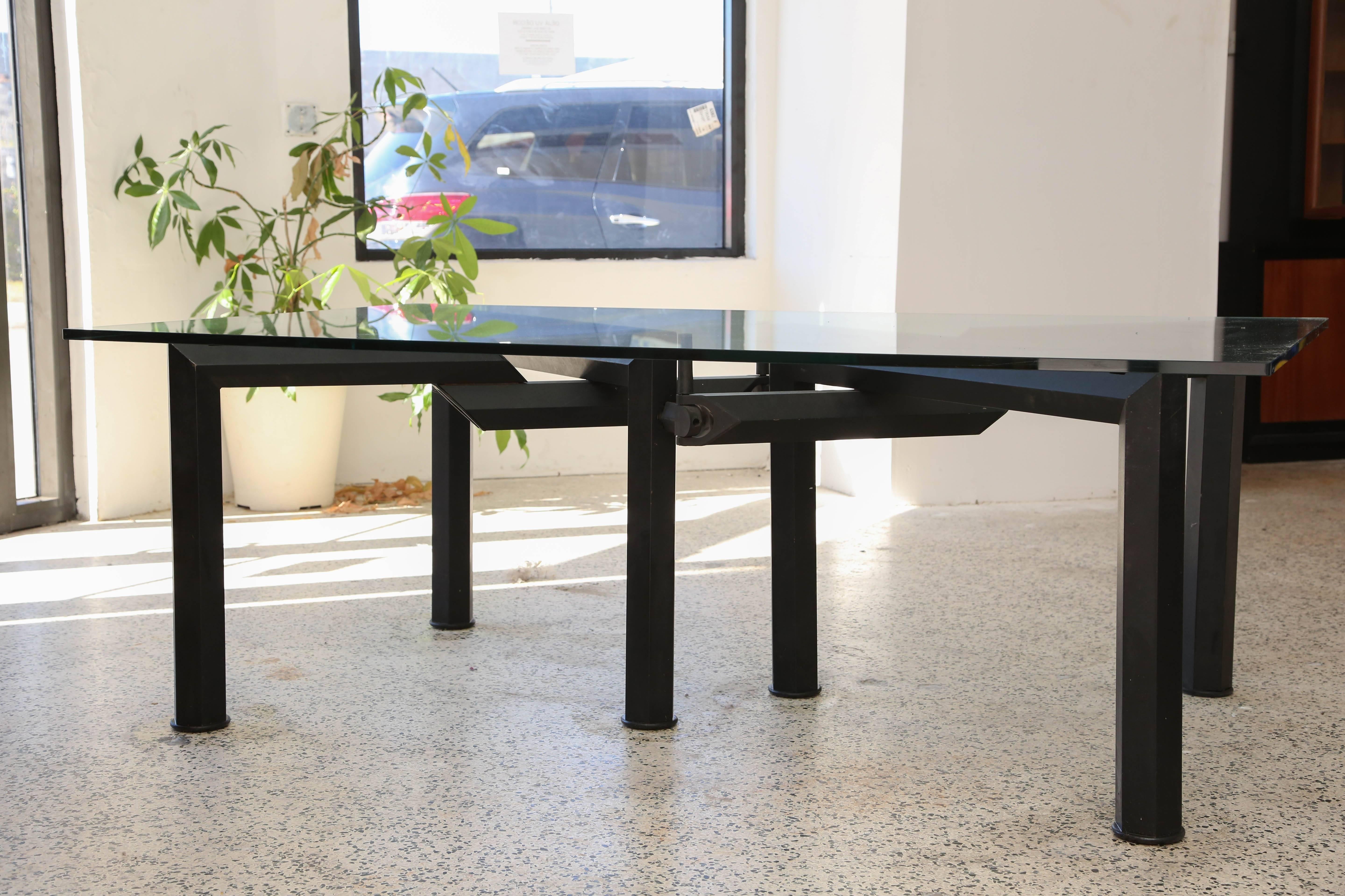 Large dining/conference table in metal and glass by Bruno Rota. We are happy to provide the original glass with this piece, free of charge, but we suggest purchasing new glass.
