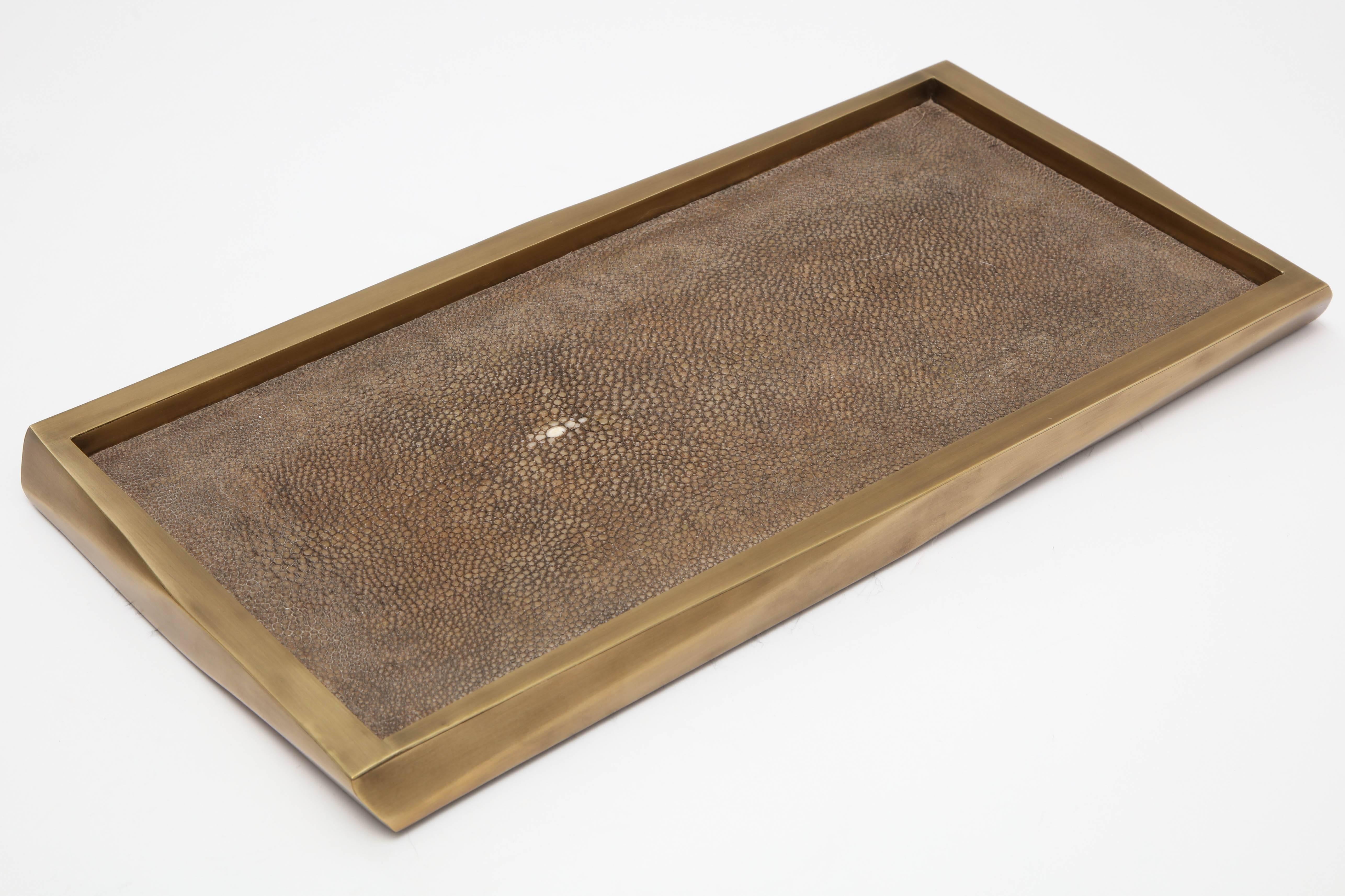 Dark taupe shagreen tray with a bronze border. Designed in France.