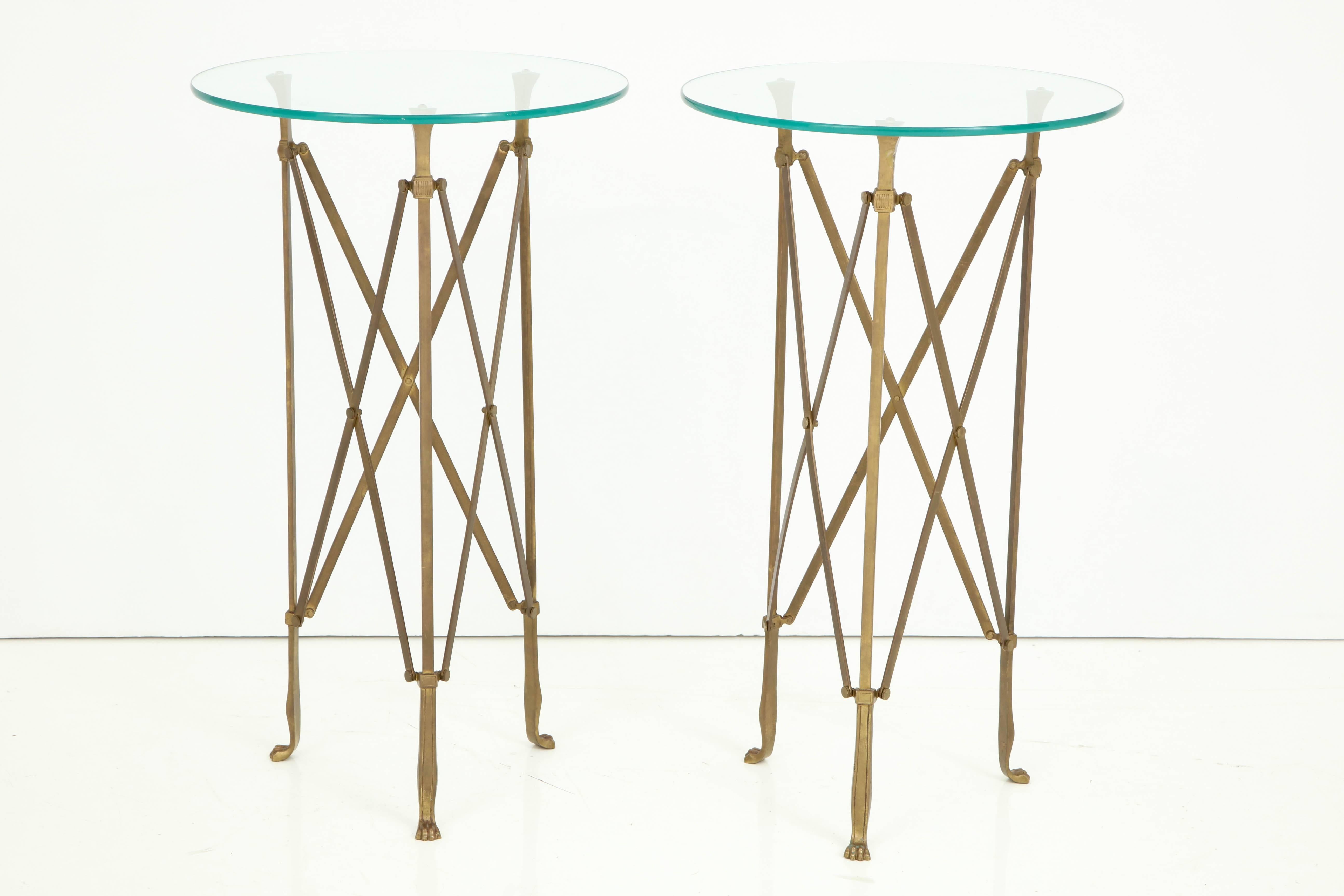 A pair of well proportioned neoclassical side tables in bronze, attributed to Jansen. The glass tops came with the tables and seem original but thicker glass or stone tops can be accommodated.
