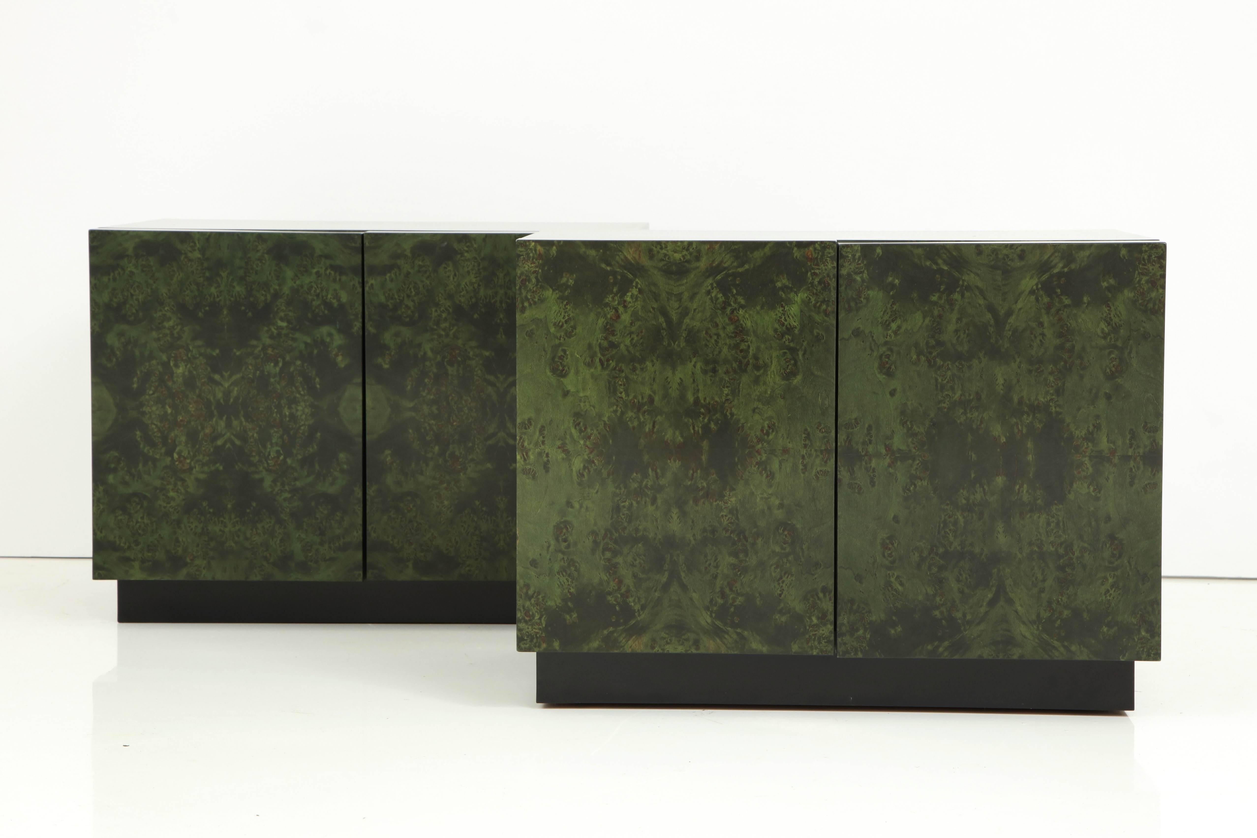 Pair of custom Emerald green aniline dyed burl walnut nightstands or side cabinets on matte black bases with two doors which conceals a shelf. Designed by Milo Baughman for Directional.