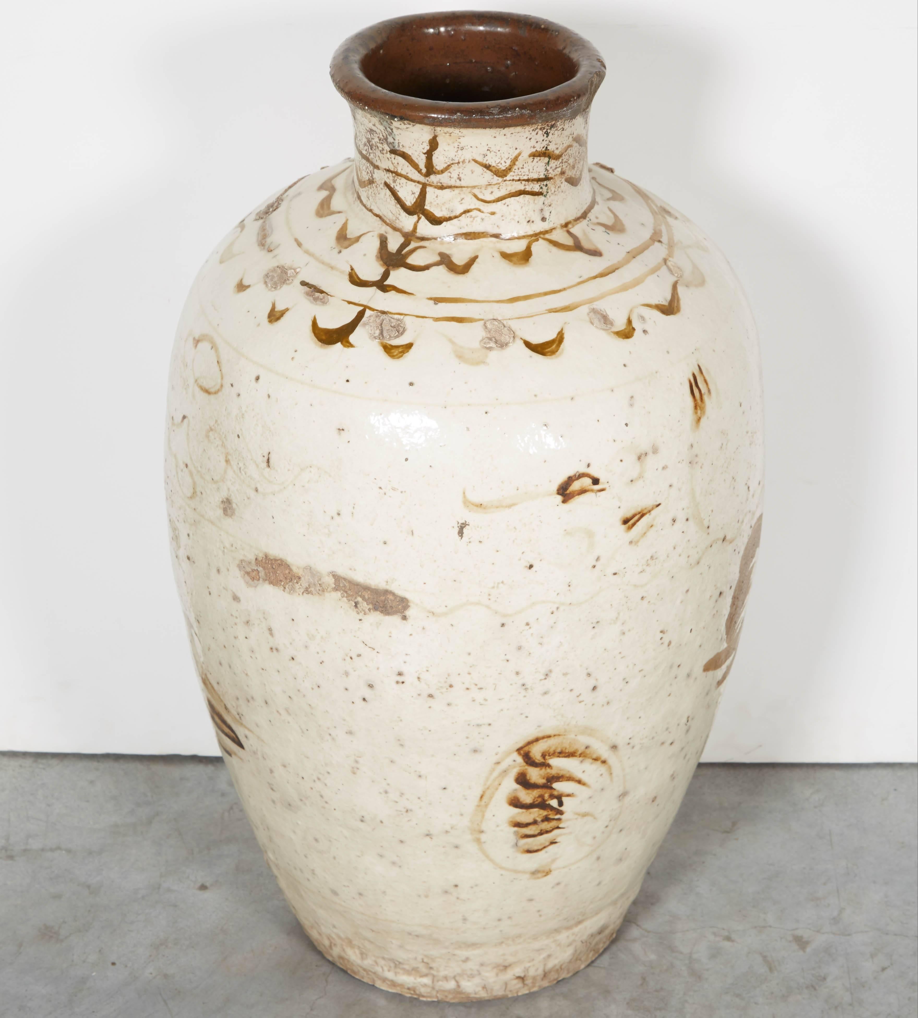A classically decorated 19th century wine jar from Shanxi province. Beautifully glazed and gracefully shaped, circa 1800. 
CR656.