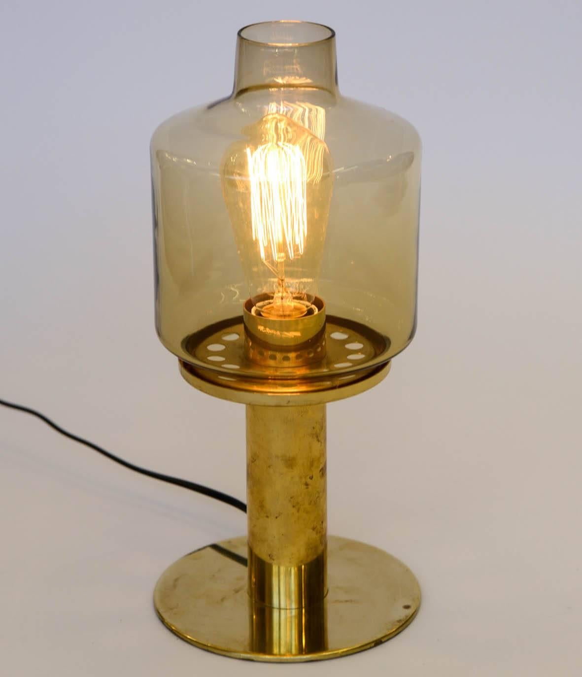 Mid-20th Century Pair of Hans-Agne Jakobsson Brass and Glass B102 Table Lamps