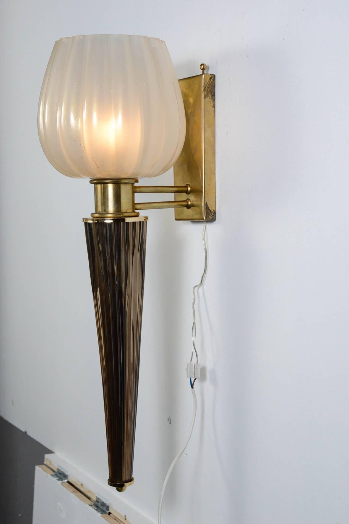 Pair of Murano glass sconces
A second pair is available.