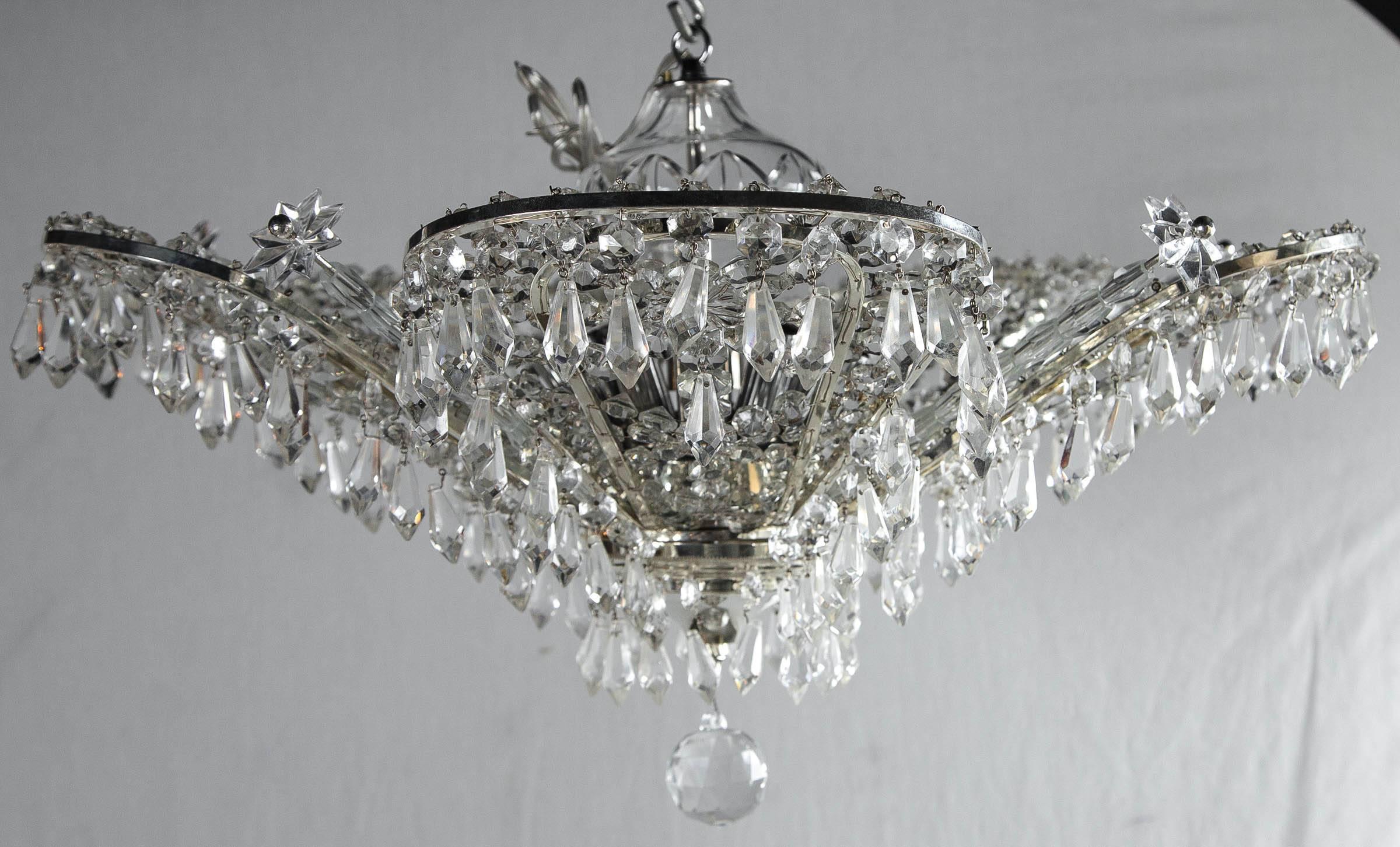 A set of four circa 1930 French silver plated and beaded crystals chandelier with ten interior lights. $6,800 each, four available.