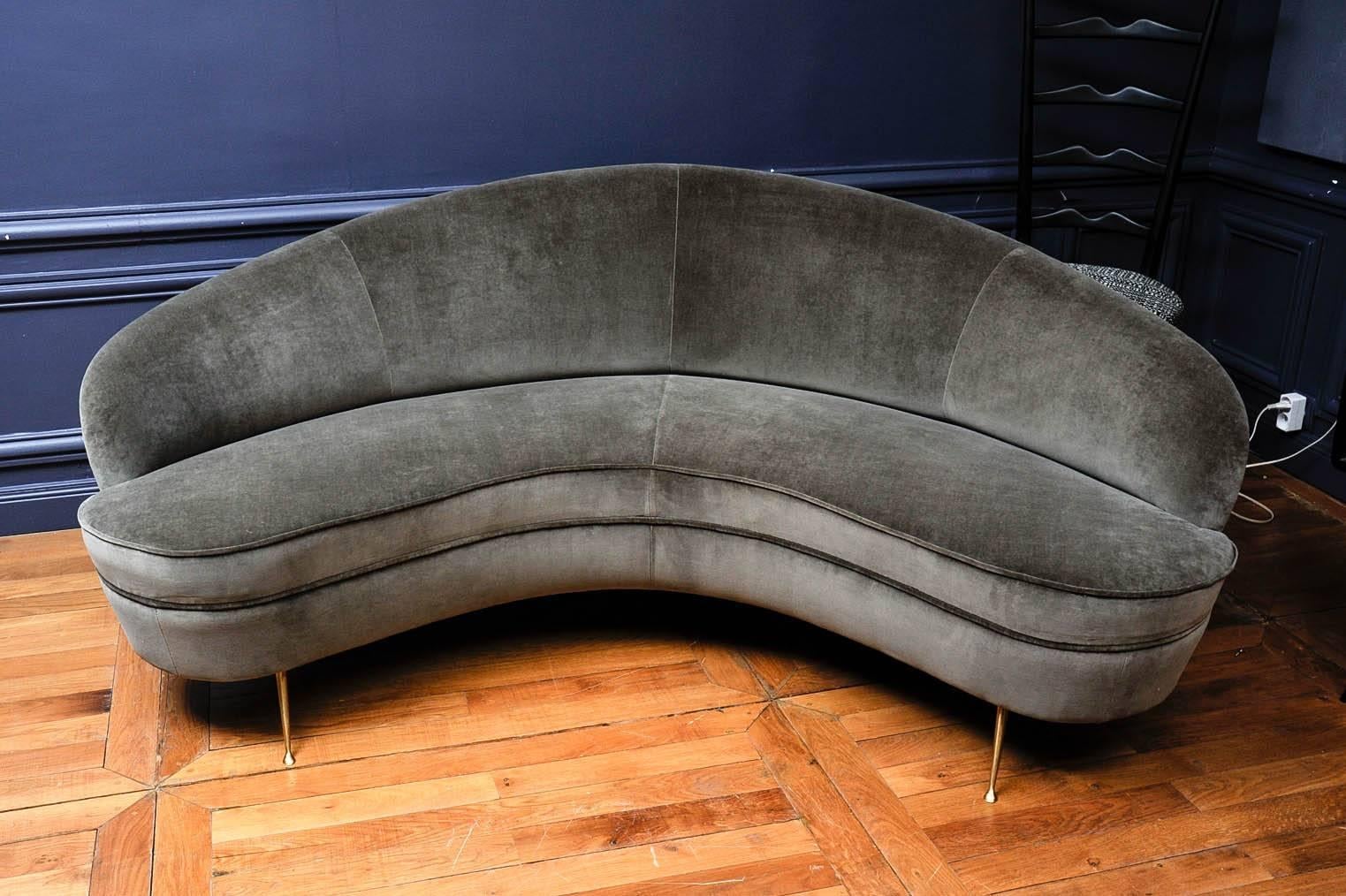 Curved sofa upholstered with 