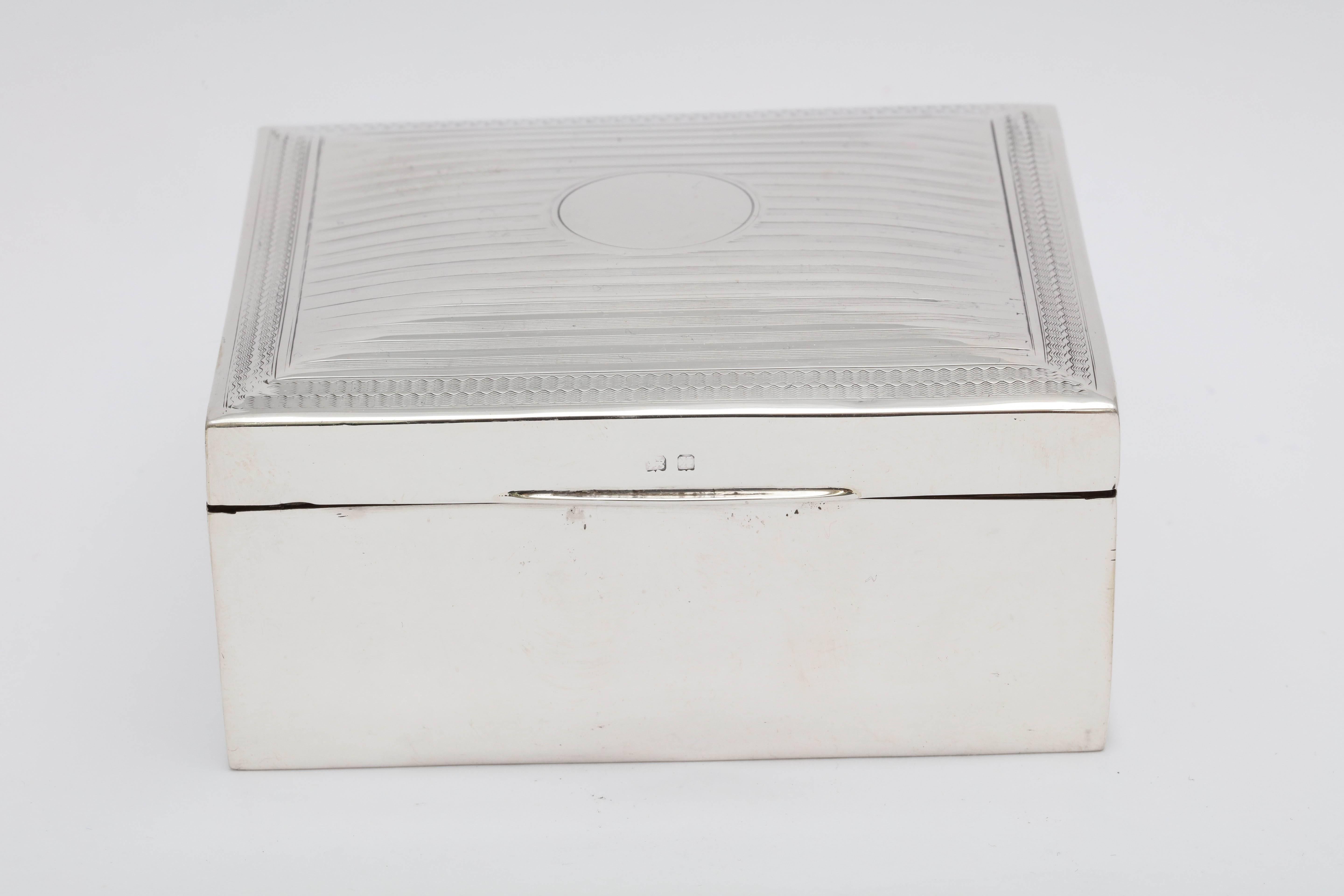 Art Deco, sterling silver, Tuxedo striped table box, Birmingham, England, 1922, H.C. Davis - maker. Wood lined; leather underside. Vacant cartouche. Measures: 4 inches wide x 3 1/2 inches deep x almost 2 inches high. Some small dints in underside