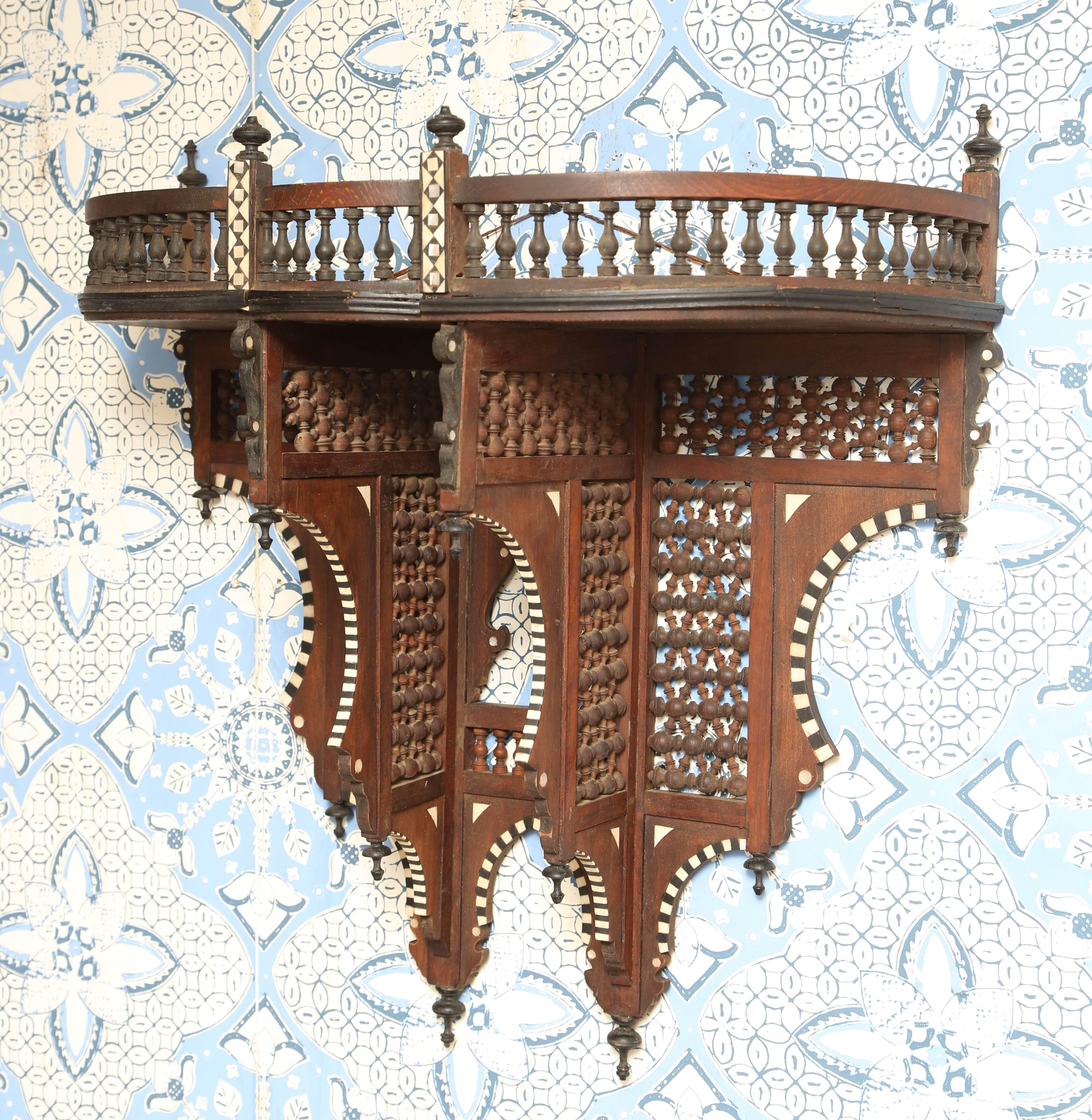 Carved frame. Mother-of-Pearl inlay. Measure: 24 1/2