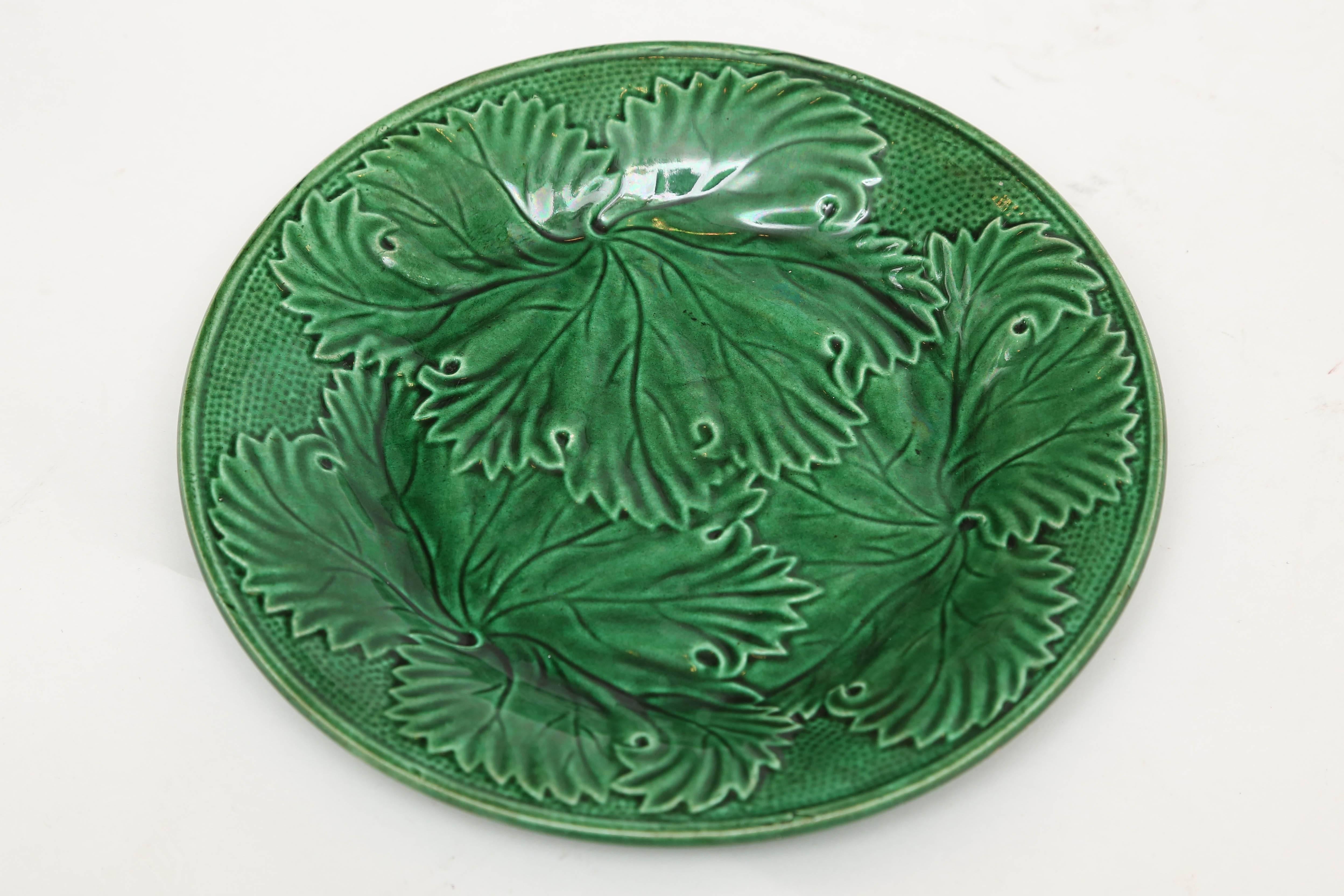 Five piece set  of antique English Majolica consisting of a serving platter and four dishes with an embossed leaf design.
Platter: 8
