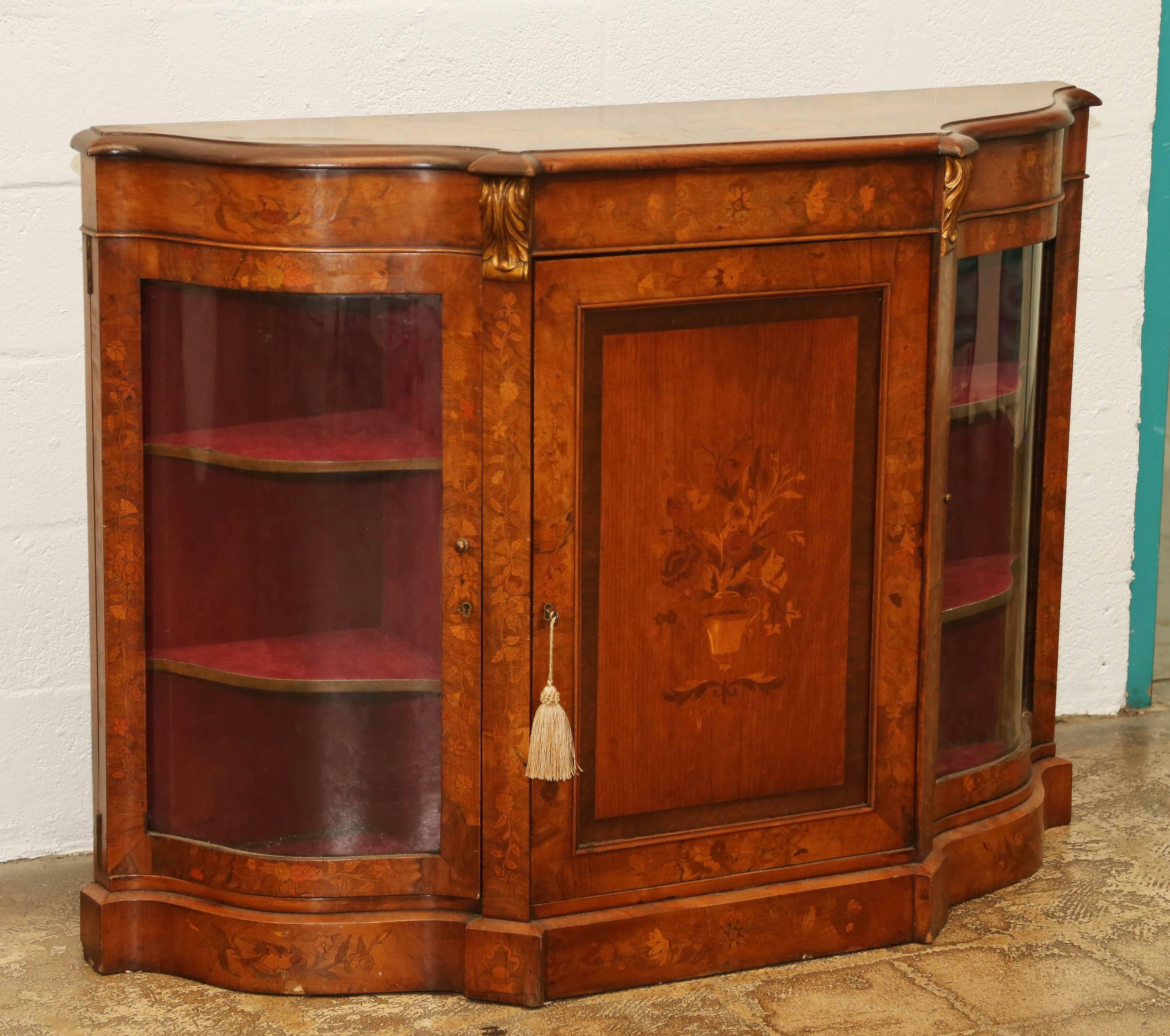 Fine marquetry inlay and graceful proportions mark this superior pair of cabinets.
Narrow width makes for easy placement.
Simply the finest quality and workmanship.