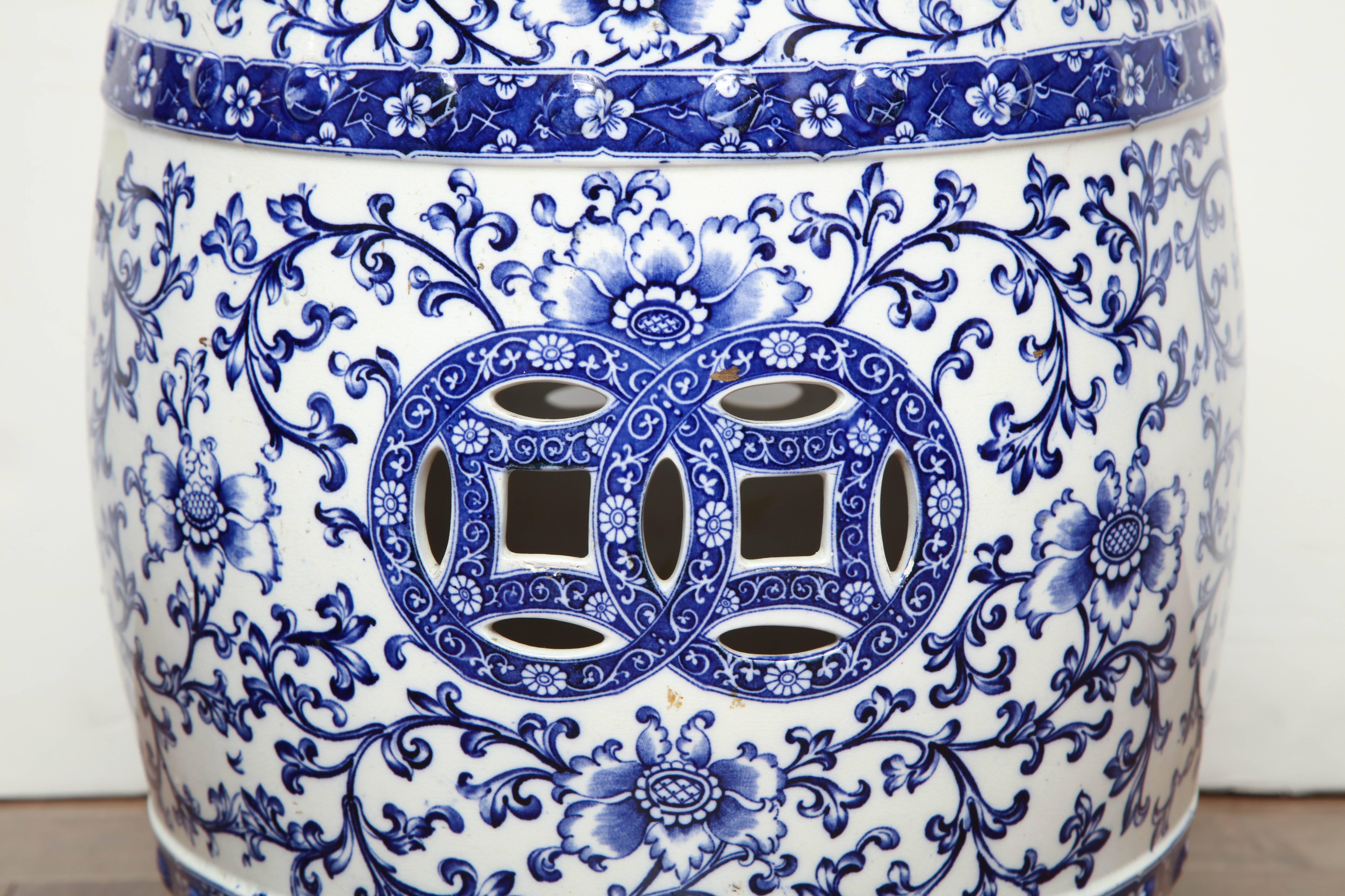 19th Century English, Minton Pottery, blue and white garden seat with repairs, handmade staples reinforcing a crack.