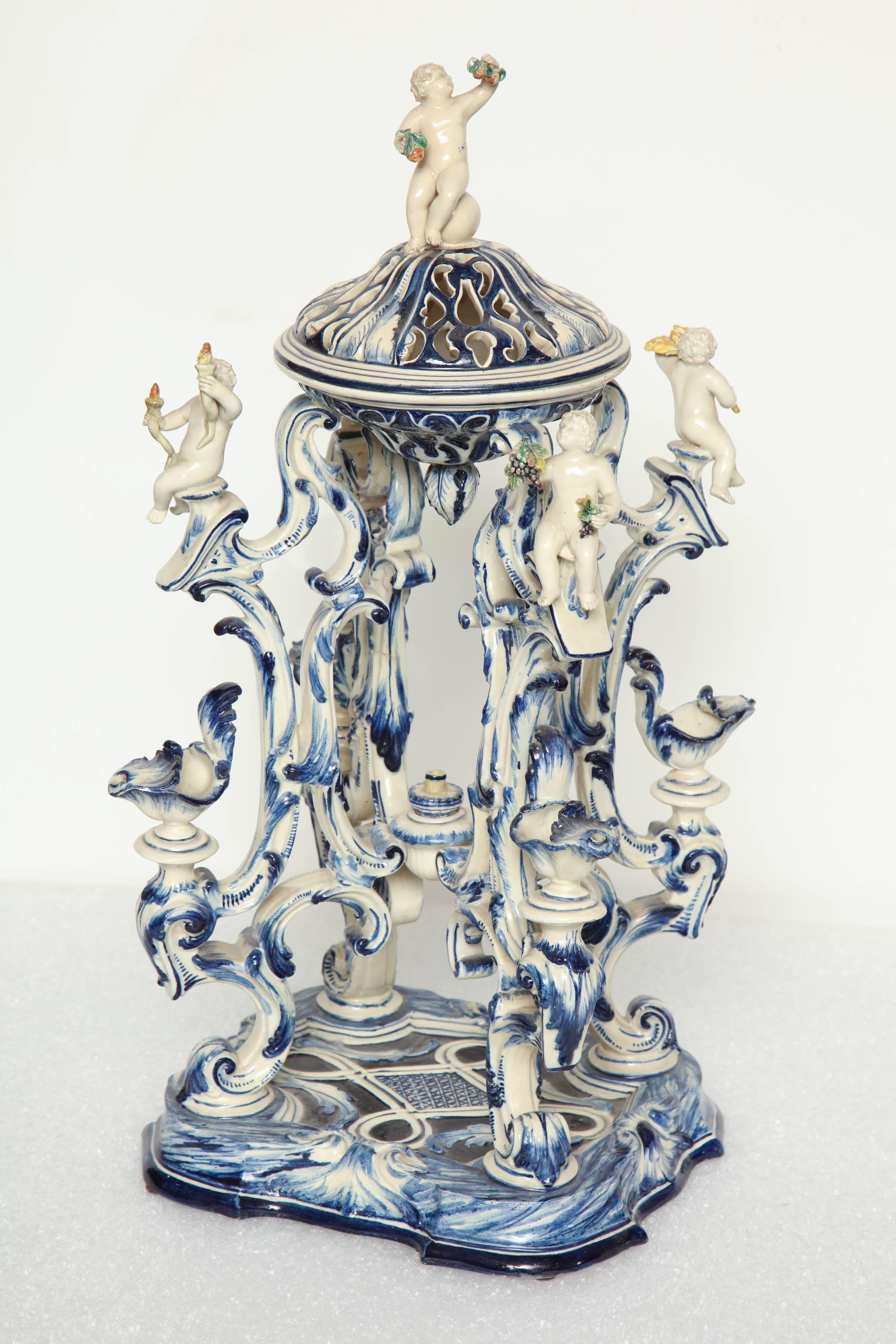 19th century Italian blue and white centrw piece depicting the four seasons.