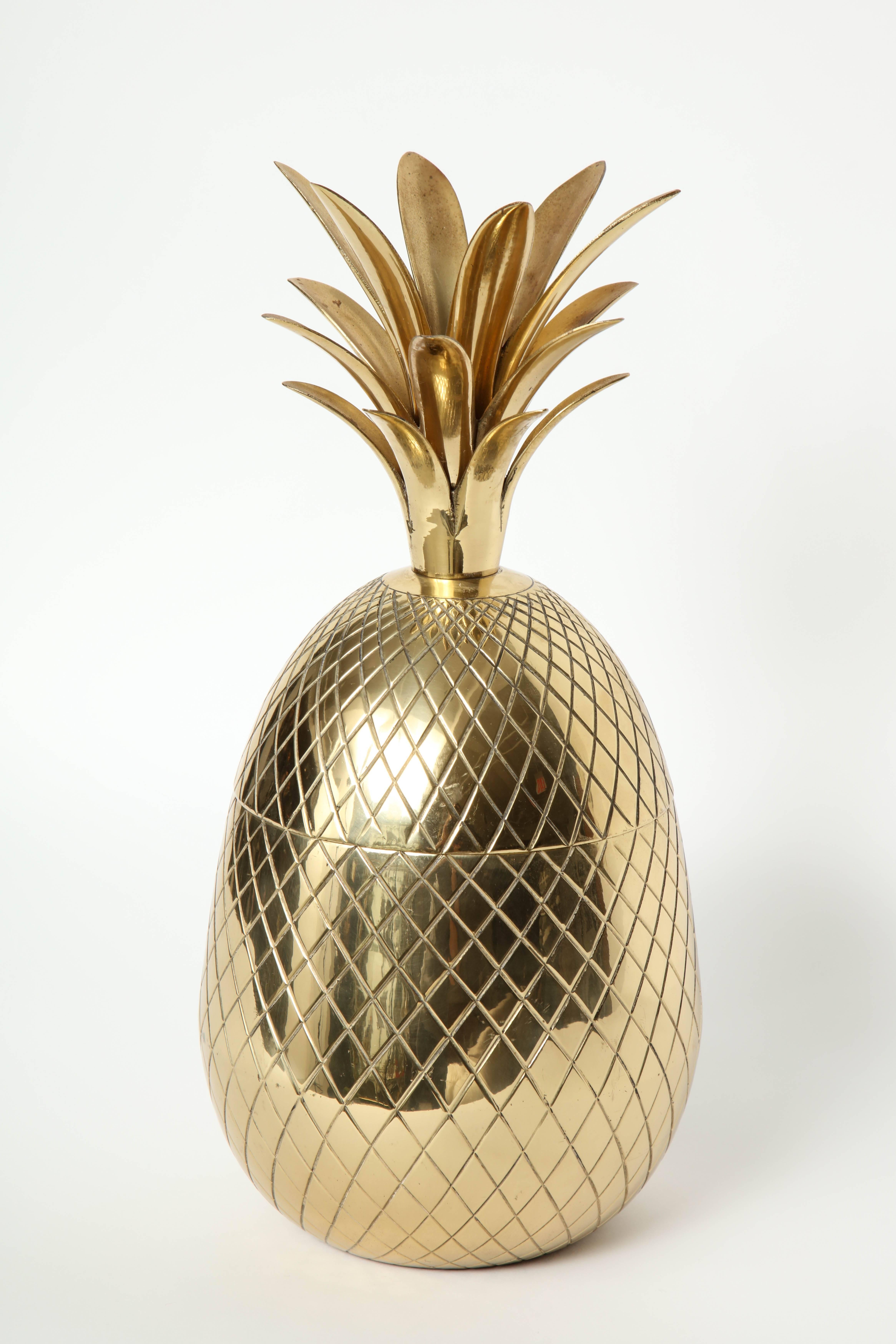 Midcentury French brass ice bucket with an Ovoid shape with an engraved trellis pattern.