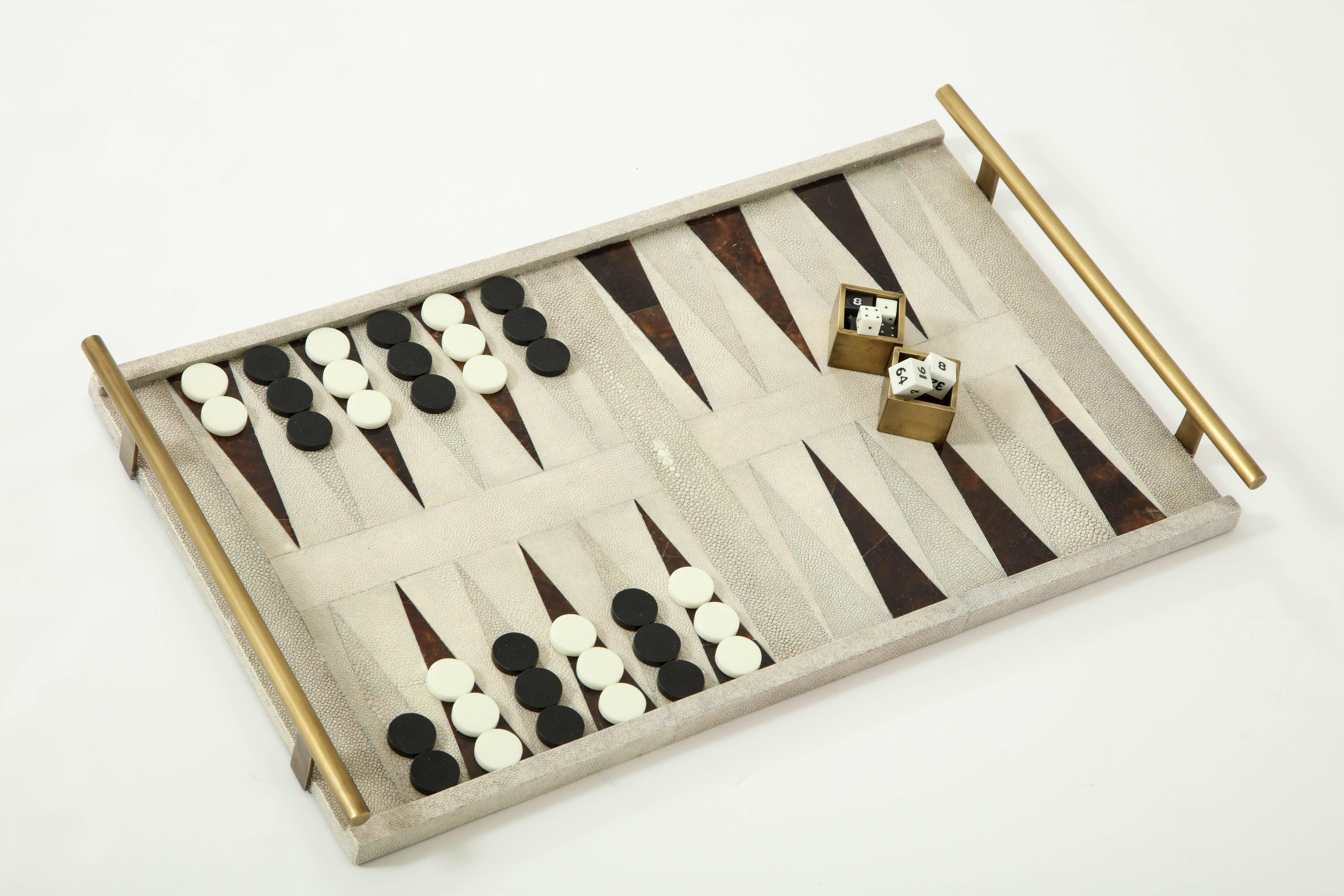 Shagreen and dark brown sea shell backgammon game with bronze handles and details.