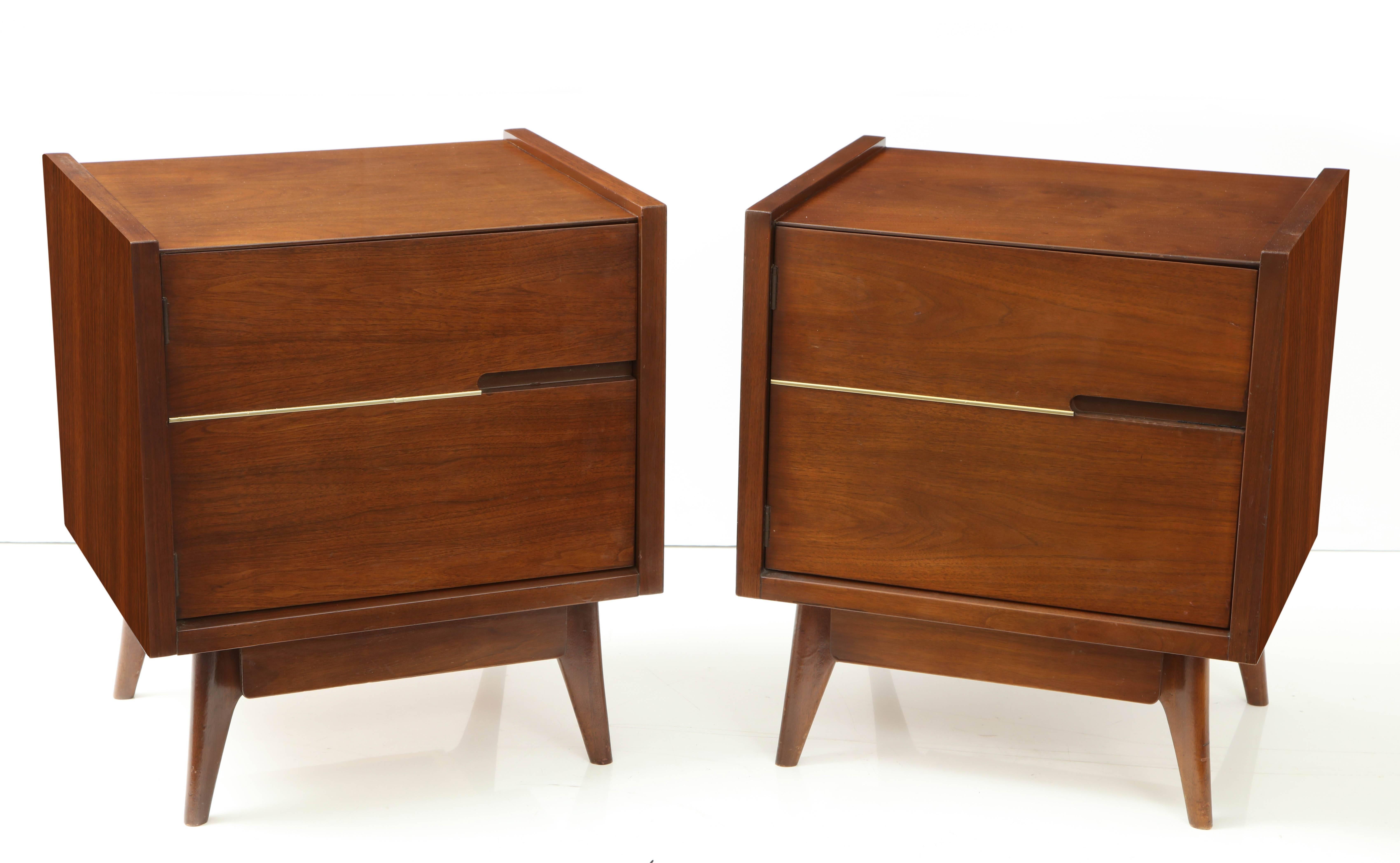 Pair of walnut midcentury commodes with one door and two shelves. Without splayed tapered legs.

 