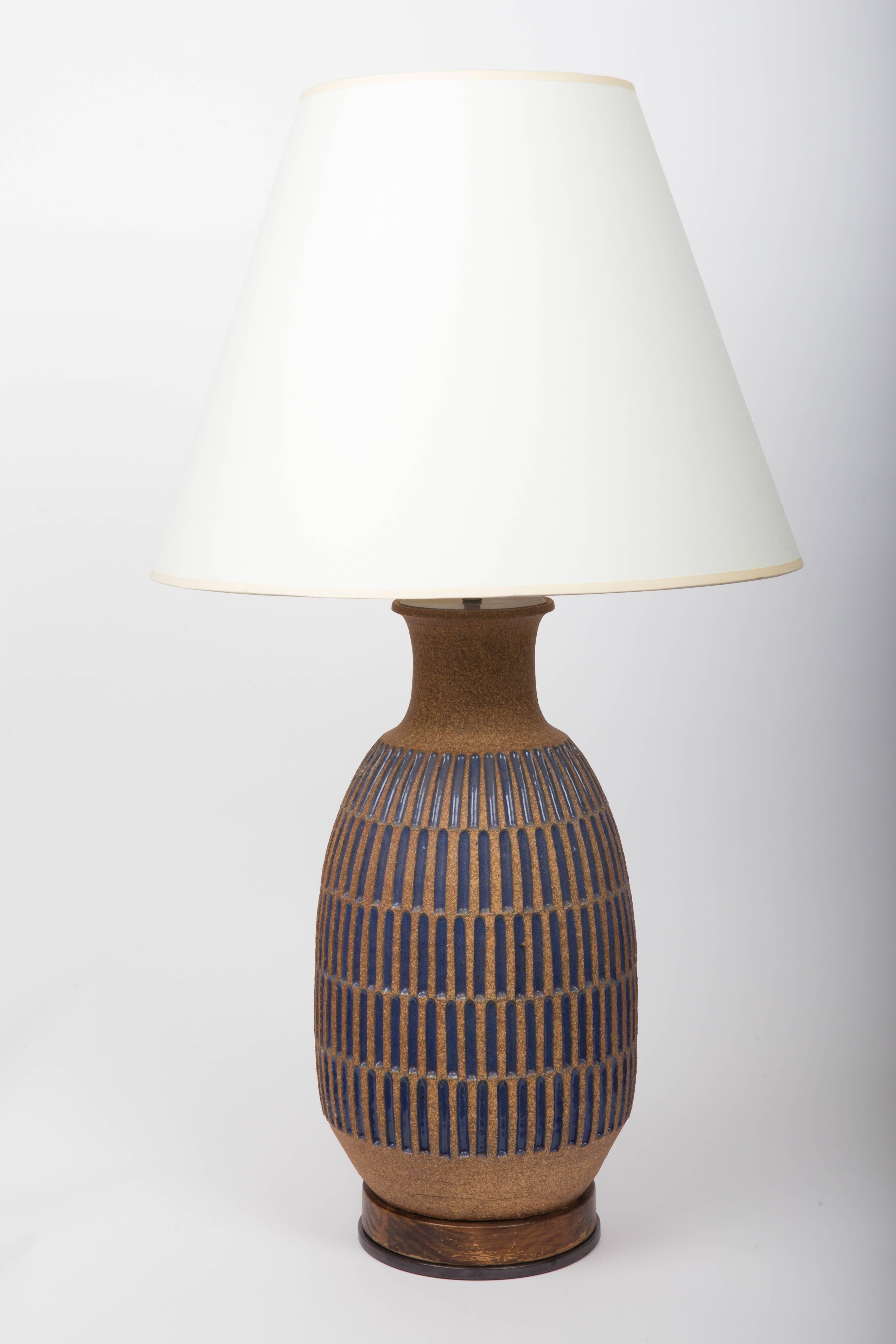 Blue glaze earthenware table lamp by David Cressey

Shade not included
Newly rewired with black twisted silk cord and bronze finish on fittings.