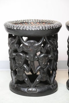 Pair of African Side Tables Extensive Woodcarving Top Inlaid Coins, Cowry Shells