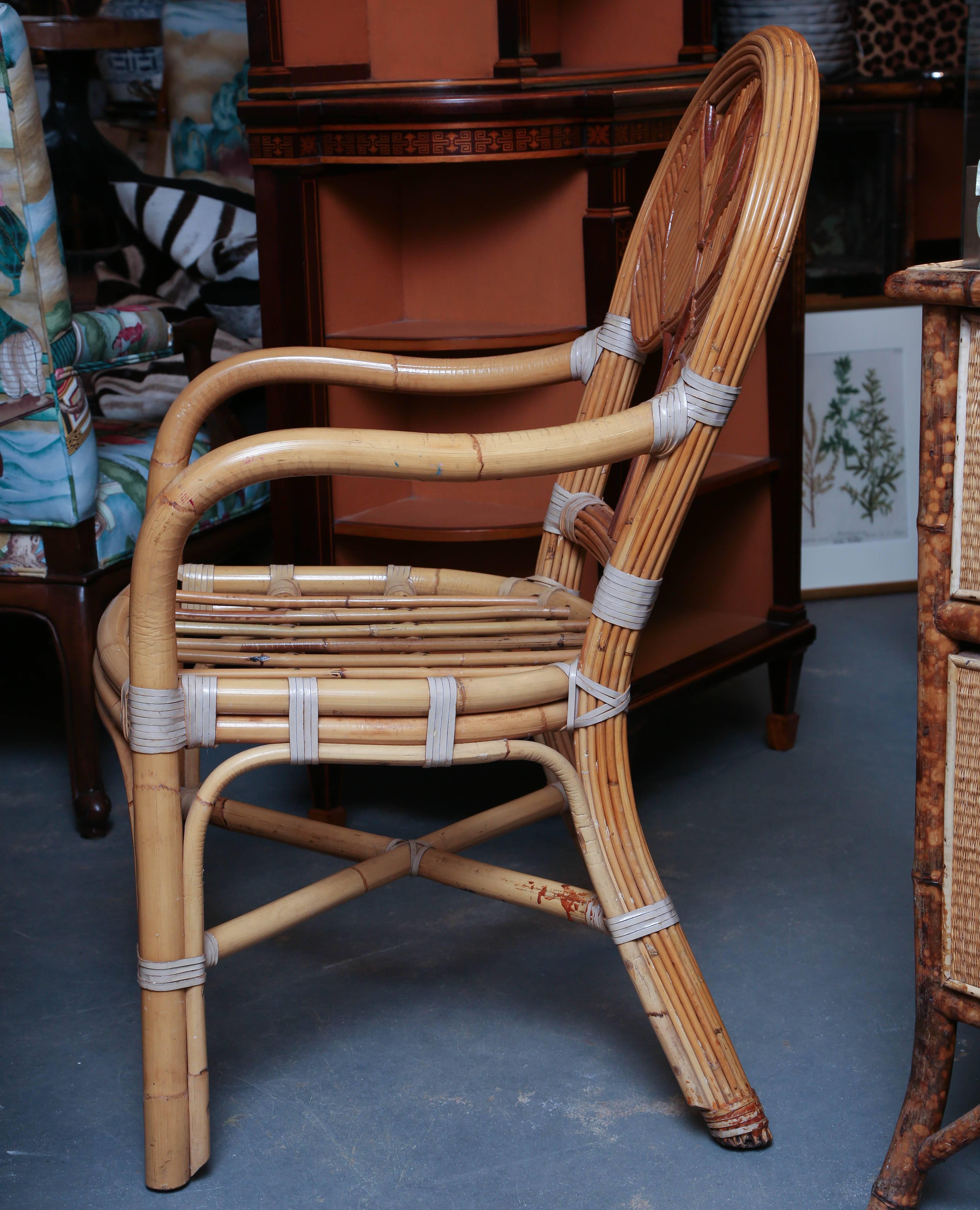 Superb palm frond motif back rests.
A splendid tropical themed set with two armchairs.
